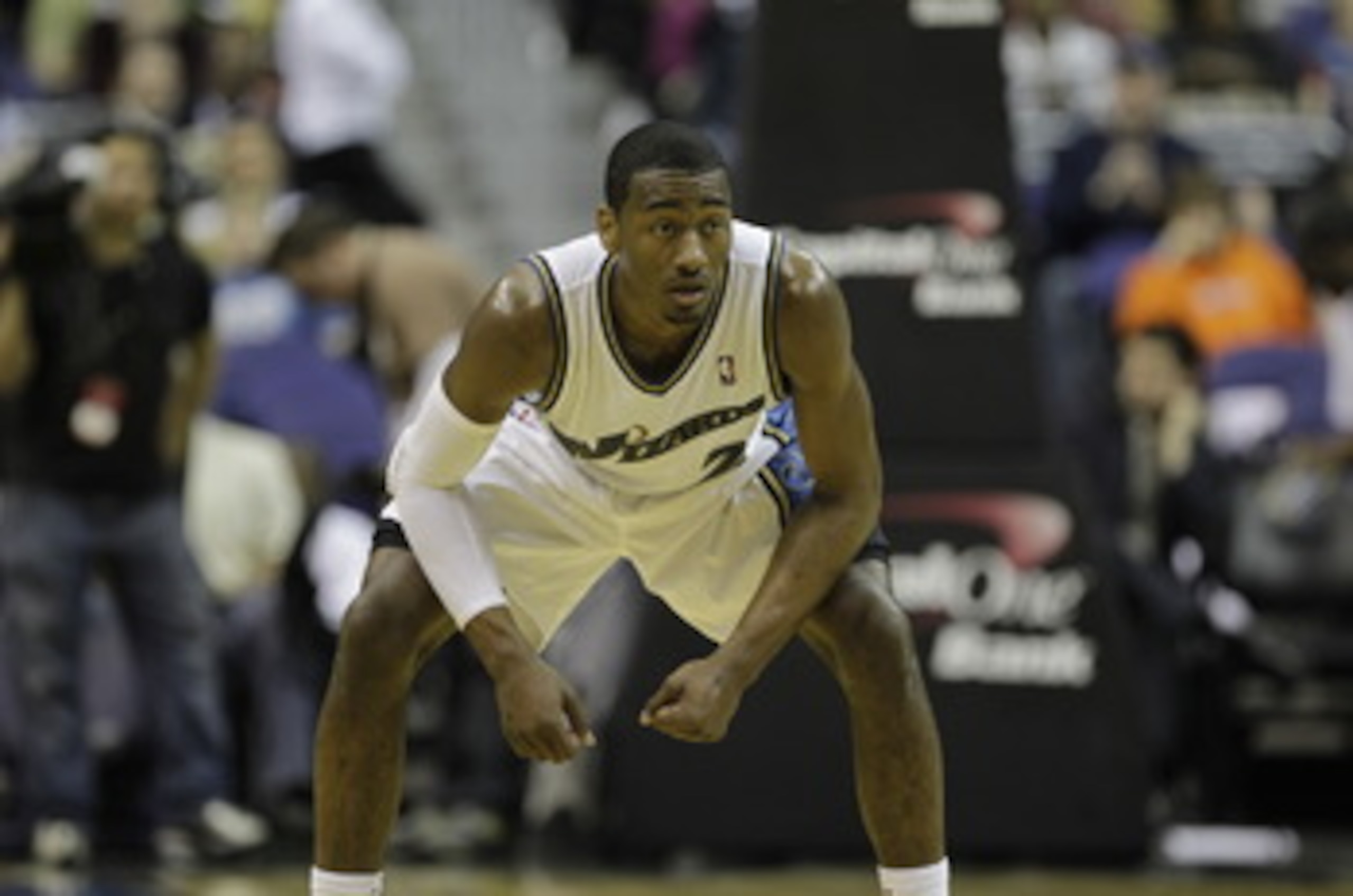 WASHINGTON, DC - MARCH 05:  John Wall #2 of the Washington Wizards shoots a free throw against the Minnesota Timberwolves at the Verizon Center on March 5, 2011 in Washington, DC. NOTE TO USER: User expressly acknowledges and agrees that, by downloading a