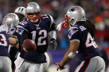 FOXBORO, MA - JANUARY 16:  Tom Brady #12 of the New England Patriots drops back with BenJarvus Green-Ellis #42 of the New England Patriots against the New York Jets during their 2011 AFC divisional playoff game at Gillette Stadium on January 16, 2011 in F