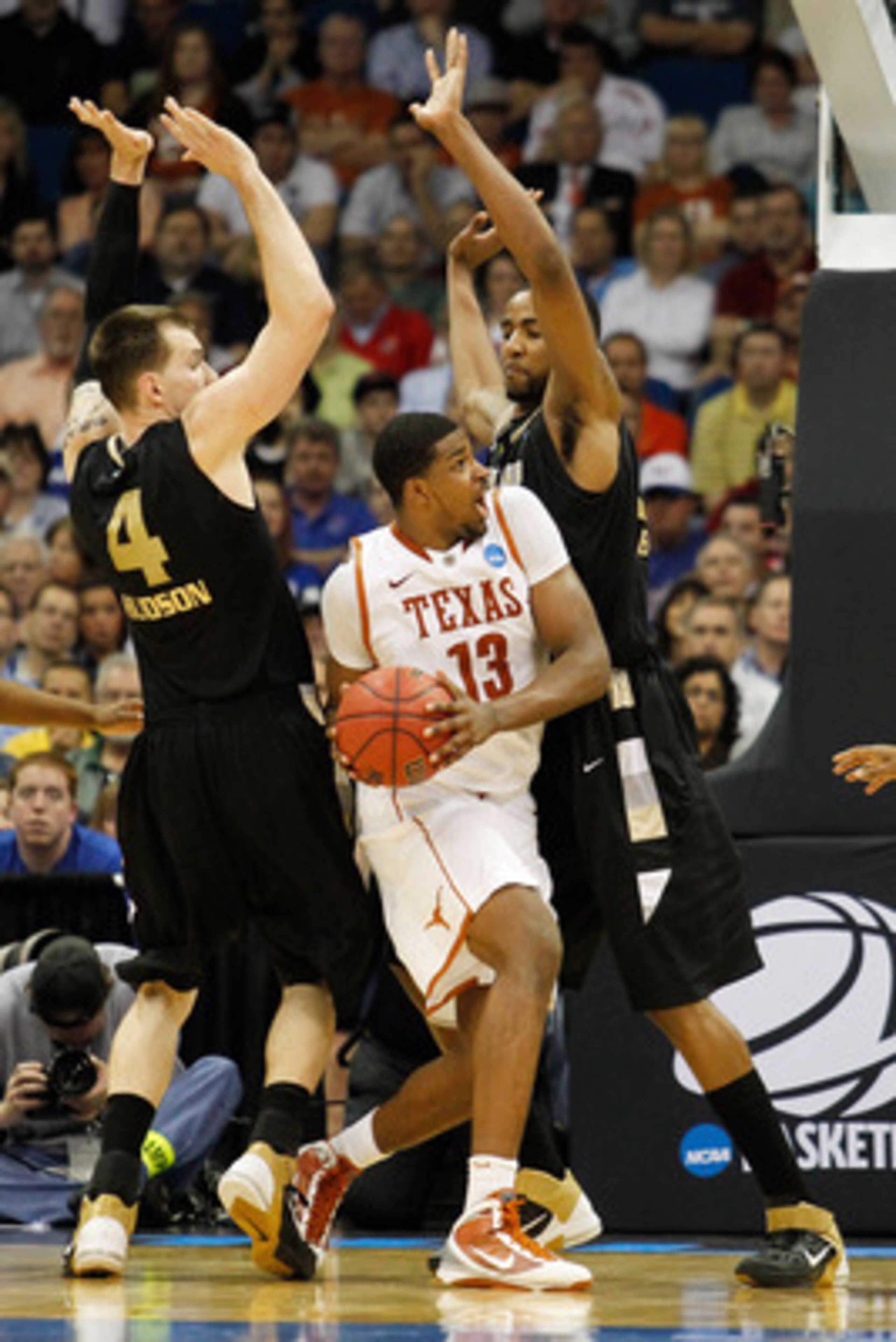 TULSA, OK - MARCH 18: Tristan Thompson #13 of the Texas Longhorns looks to take a shot against the Oakland Golden Grizzlies during the second round of the 2011 NCAA men's basketball tournament at BOK Center on March 18, 2011 in Tulsa, Oklahoma. (Photo b TULSA, OK - MARCH 18: Tristan Thompson #13 of the Texas Longhorns looks to take a shot against the Oakland Golden Grizzlies during the second round of the 2011 NCAA men's basketball tournament at BOK Center on March 18, 2011 in Tulsa, Oklahoma. (Photo b