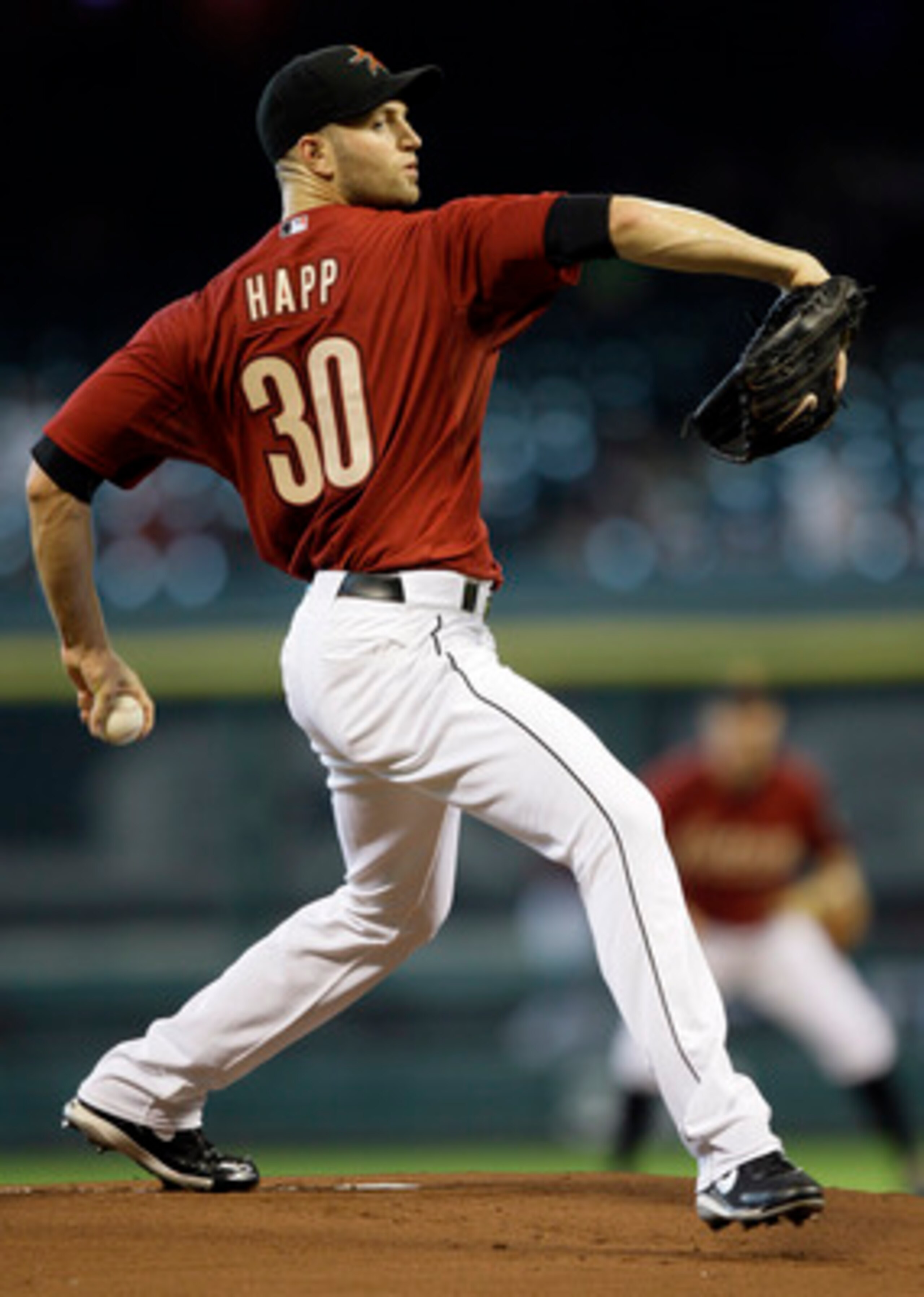 HOUSTON - MAY 29:  Pitcher J.A. Happ #30 of the Houston Astros throws in the first inning against the Arizona Diamondbacks at Minute Maid Park on May 29, 2011 in Houston, Texas.  (Photo by Bob Levey/Getty Images)