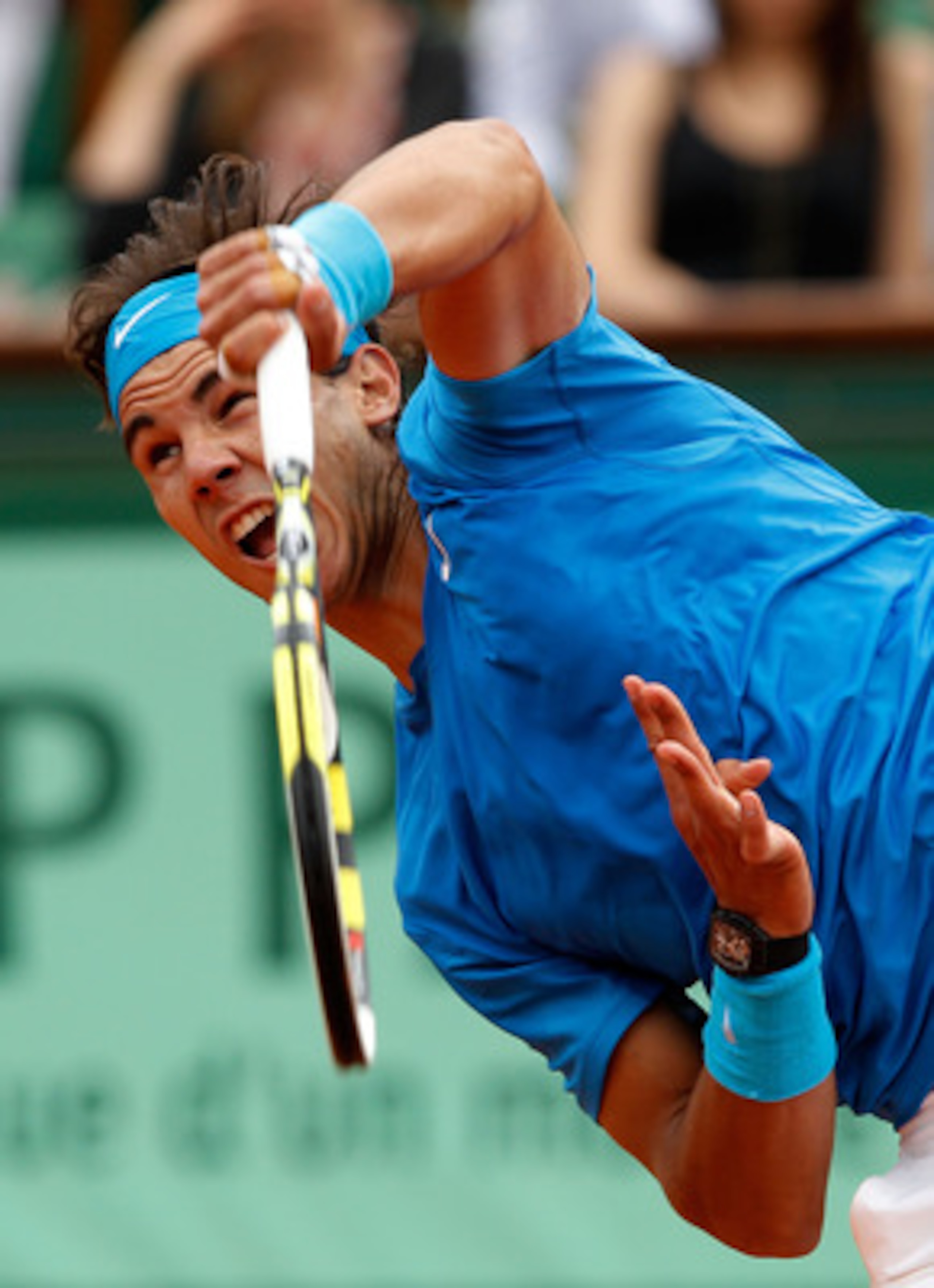 PARIS, FRANCE - MAY 30:  Rafael Nadal of Spain serves during the men's singles round four match between Rafael Nadal of Spain and Ivan Lubicic of Croatia on day nine of the French Open at Roland Garros on May 30, 2011 in Paris, France.  (Photo by Matthew 