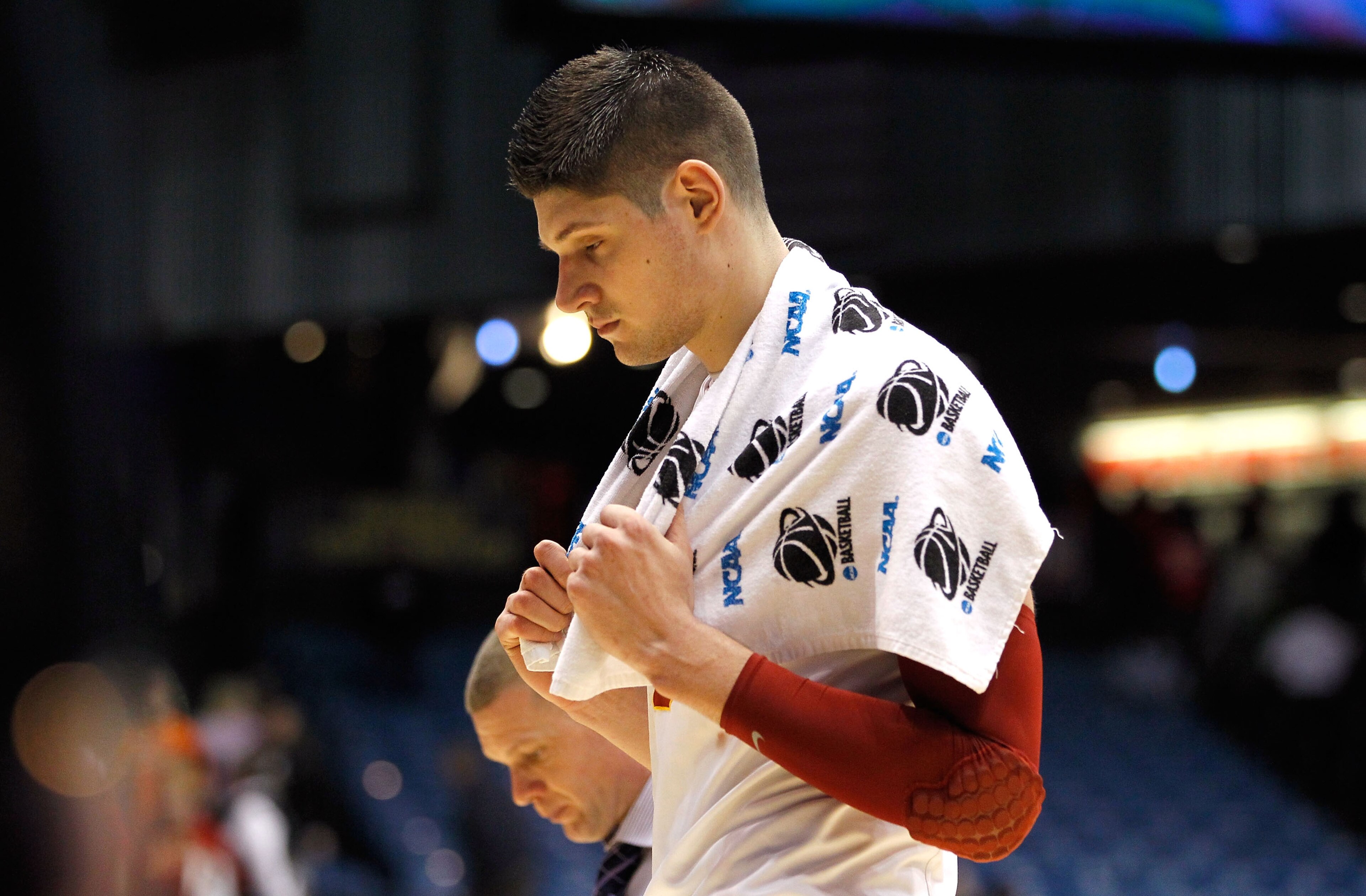 DAYTON, OH - MARCH 16: Nikola Vucevic #5 of the USC Trojans walks off the court after being defeated by the Virginia Commonwealth Rams during the first round of the 2011 NCAA men's basketball tournament at UD Arena on March 16, 2011 in Dayton, Ohio. (Ph DAYTON, OH - MARCH 16: Nikola Vucevic #5 of the USC Trojans walks off the court after being defeated by the Virginia Commonwealth Rams during the first round of the 2011 NCAA men's basketball tournament at UD Arena on March 16, 2011 in Dayton, Ohio. (Ph