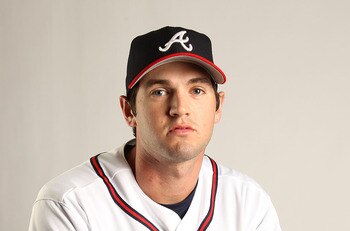 LAKE BUENA VISTA, FL - FEBRUARY 21:  Cory Gearrin #62 of the Atlanta Braves during Photo Day at  Champion Stadium at ESPN Wide World of Sports of Complex on February 21, 2011 in Lake Buena Vista, Florida.  (Photo by Mike Ehrmann/Getty Images)
