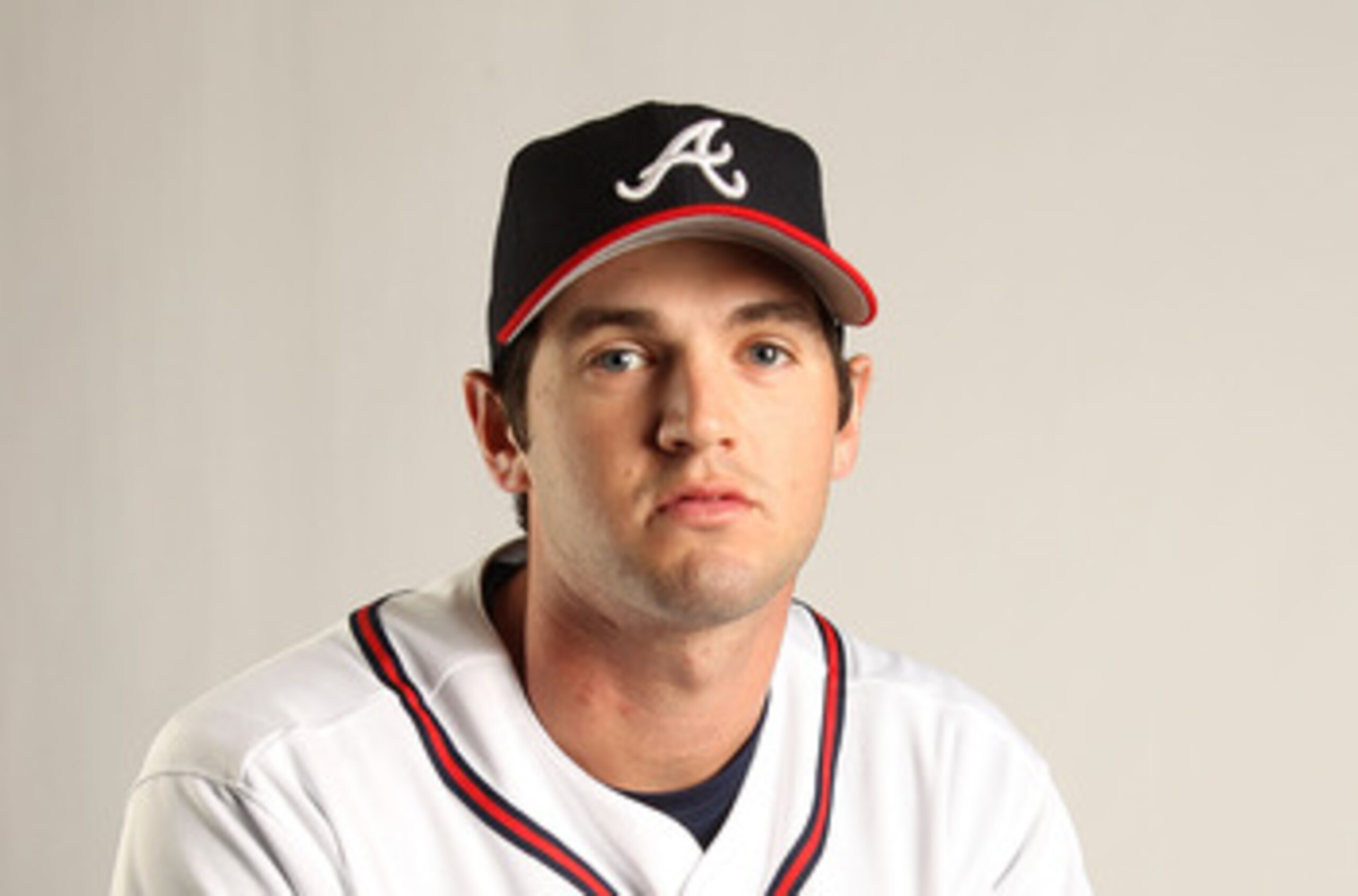 LAKE BUENA VISTA, FL - FEBRUARY 21:  Cory Gearrin #62 of the Atlanta Braves during Photo Day at  Champion Stadium at ESPN Wide World of Sports of Complex on February 21, 2011 in Lake Buena Vista, Florida.  (Photo by Mike Ehrmann/Getty Images)