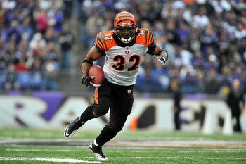 BALTIMORE, MD - JANUARY 2:  Cedric Benson #32 of the Cincinnati Bengals runs the ball against the Baltimore Ravens at M&T Bank Stadium on January 2, 2011 in Baltimore, Maryland. The Ravens defeated the Bengals 13-6. (Photo by Larry French/Getty Images)