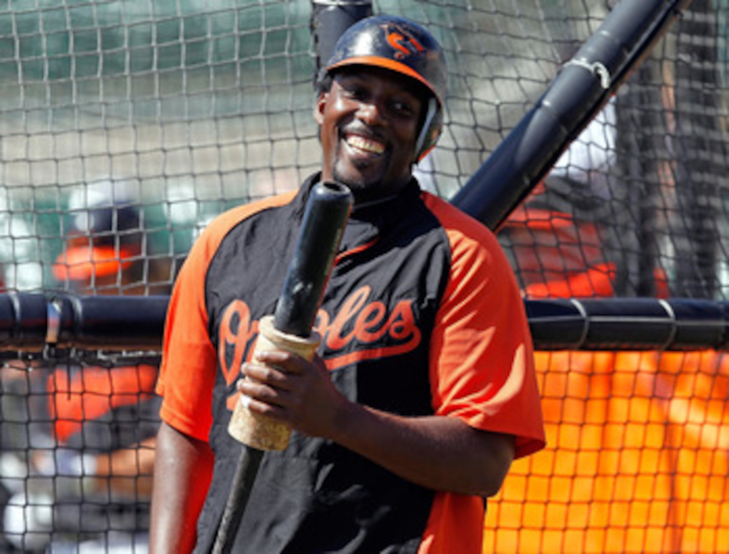 SARASOTA, FL - MARCH 03:  Designated hitter Vladimir Guerrero #27 of the Baltimore Orioles smiles during batting practice just before the Grapefruit League Spring Training Game against the Minnesota Twins at Ed Smith Stadium on March 3, 2011 in Sarasota,