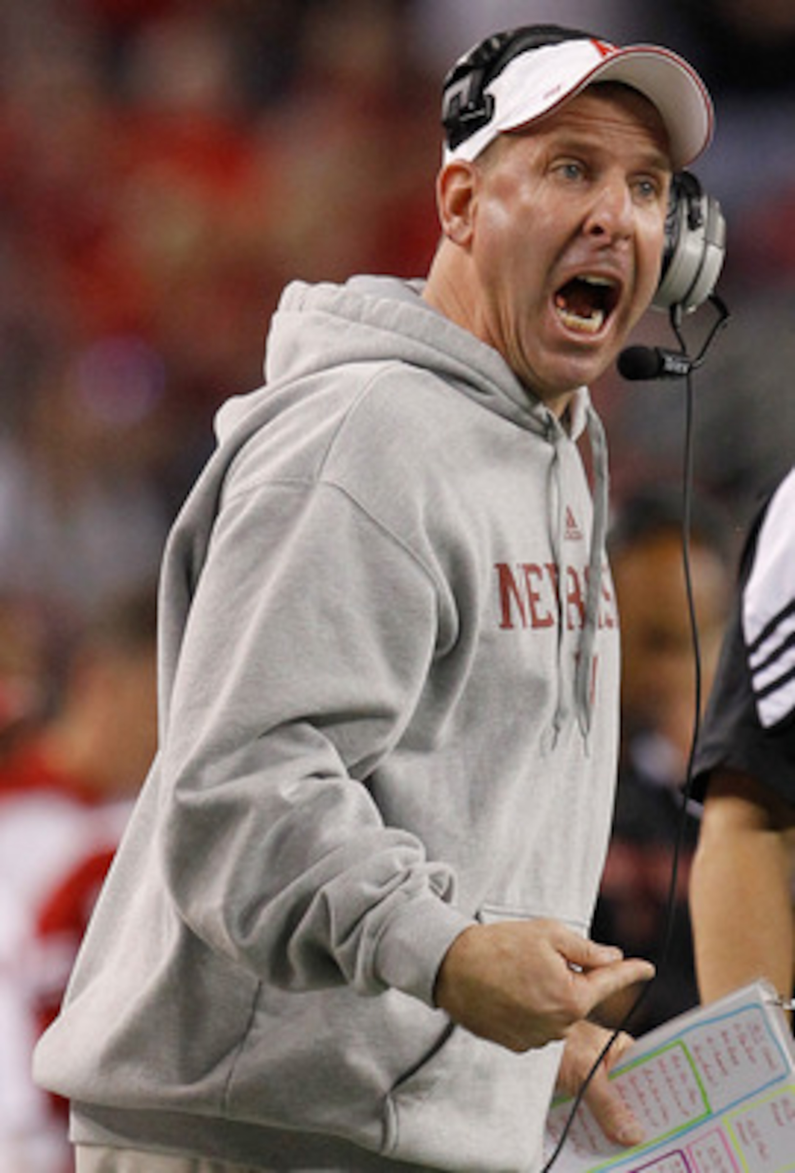 ARLINGTON, TX - DECEMBER 04: Head coach Bo Pelini of the Nebraska Cornhuskers leads his team against the Oklahoma Sooners at Cowboys Stadium on December 4, 2010 in Arlington, Texas. The Sooners beat the Cornhuskers 23-20. (Photo by Tom Pennington/Getty ARLINGTON, TX - DECEMBER 04: Head coach Bo Pelini of the Nebraska Cornhuskers leads his team against the Oklahoma Sooners at Cowboys Stadium on December 4, 2010 in Arlington, Texas. The Sooners beat the Cornhuskers 23-20. (Photo by Tom Pennington/Getty
