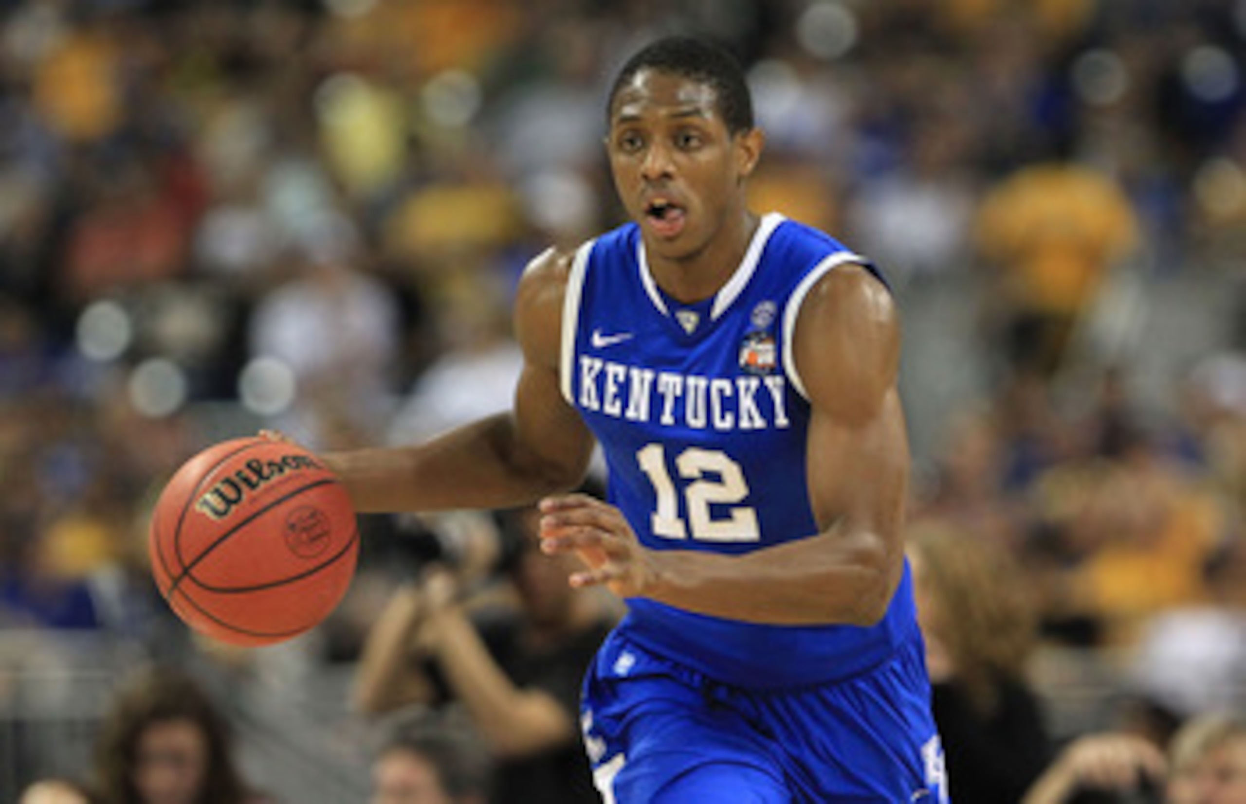 HOUSTON, TX - APRIL 02:  Brandon Knight #12 of the Kentucky Wildcats moves the ball while taking on the Connecticut Huskies during the National Semifinal game of the 2011 NCAA Division I Men's Basketball Championship at Reliant Stadium on April 2, 2011 in