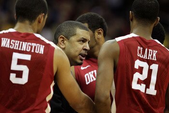 KANSAS CITY, MO - MARCH 09:  Head coach Jeff Capel of the Oklahoma Sooners speaks to his team during their game against the Baylor Bears in the first round of the 2011 Phillips 66 Big 12 Men's Basketball Tournament at Sprint Center on March 9, 2011 in Kan