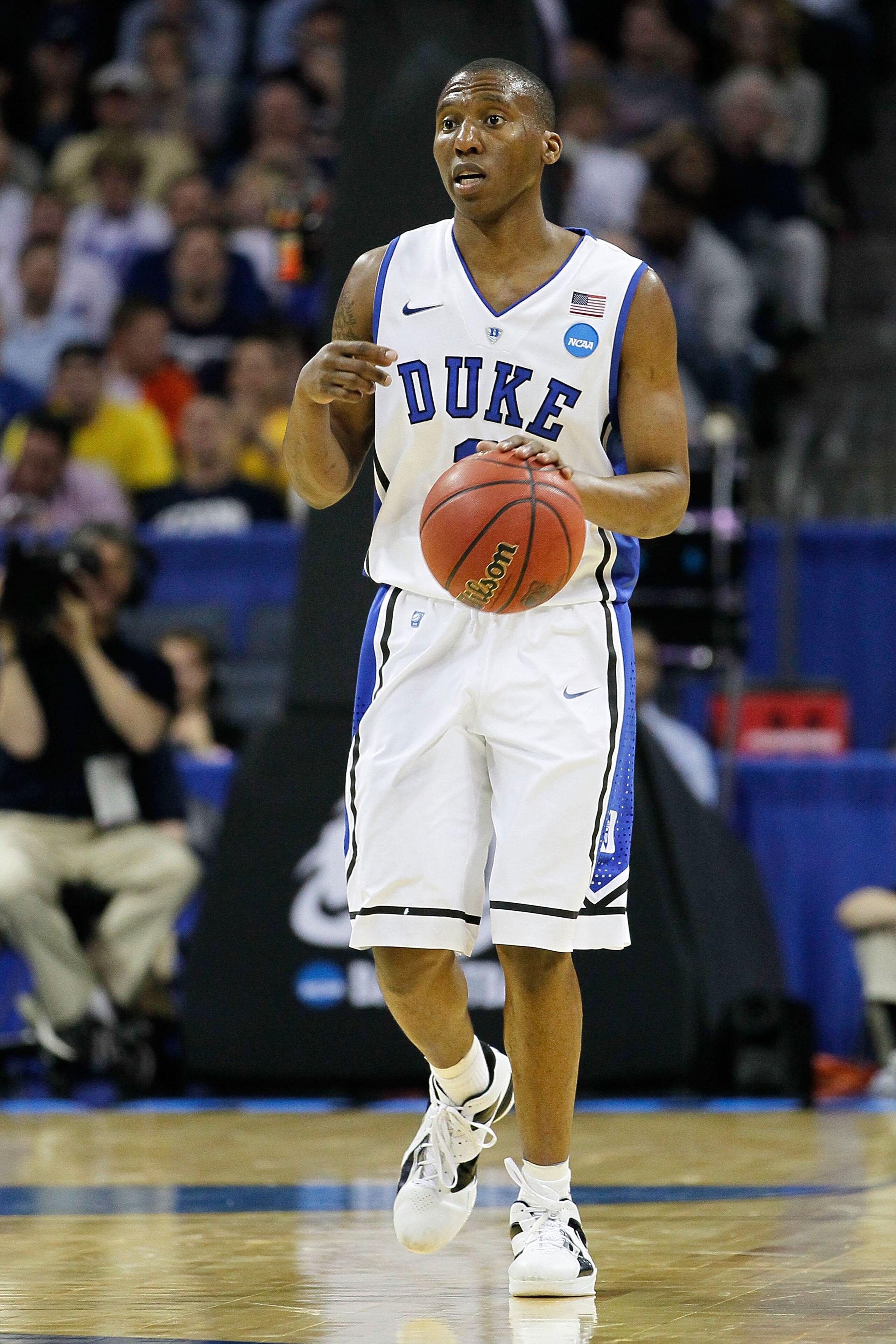 CHARLOTTE, NC - MARCH 20:  Nolan Smith #2 of the Duke Blue Devils moves the ball while taking on the Michigan Wolverines during the third round of the 2011 NCAA men's basketball tournament at Time Warner Cable Arena on March 20, 2011 in Charlotte, North C