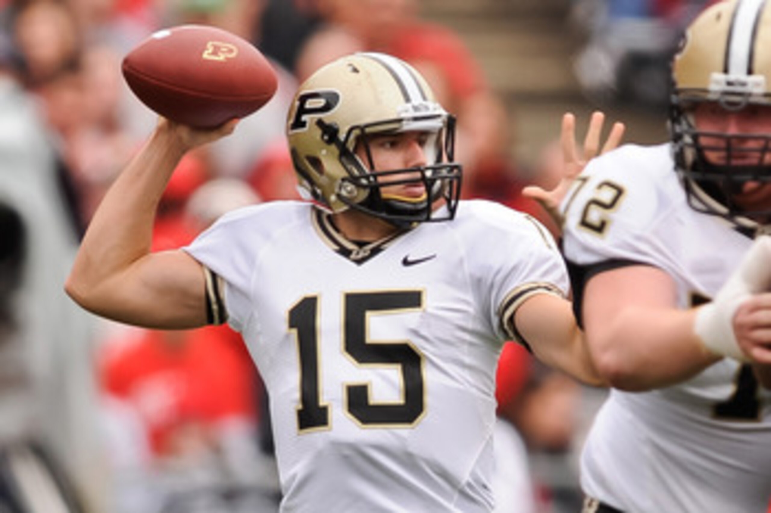 COLUMBUS, OH - OCTOBER 23:  Quarterback Rob Henry #15 of the Purdue Boilermakers drops back to pass against the Ohio State Buckeyes at Ohio Stadium on October 23, 2010 in Columbus, Ohio.  (Photo by Jamie Sabau/Getty Images)