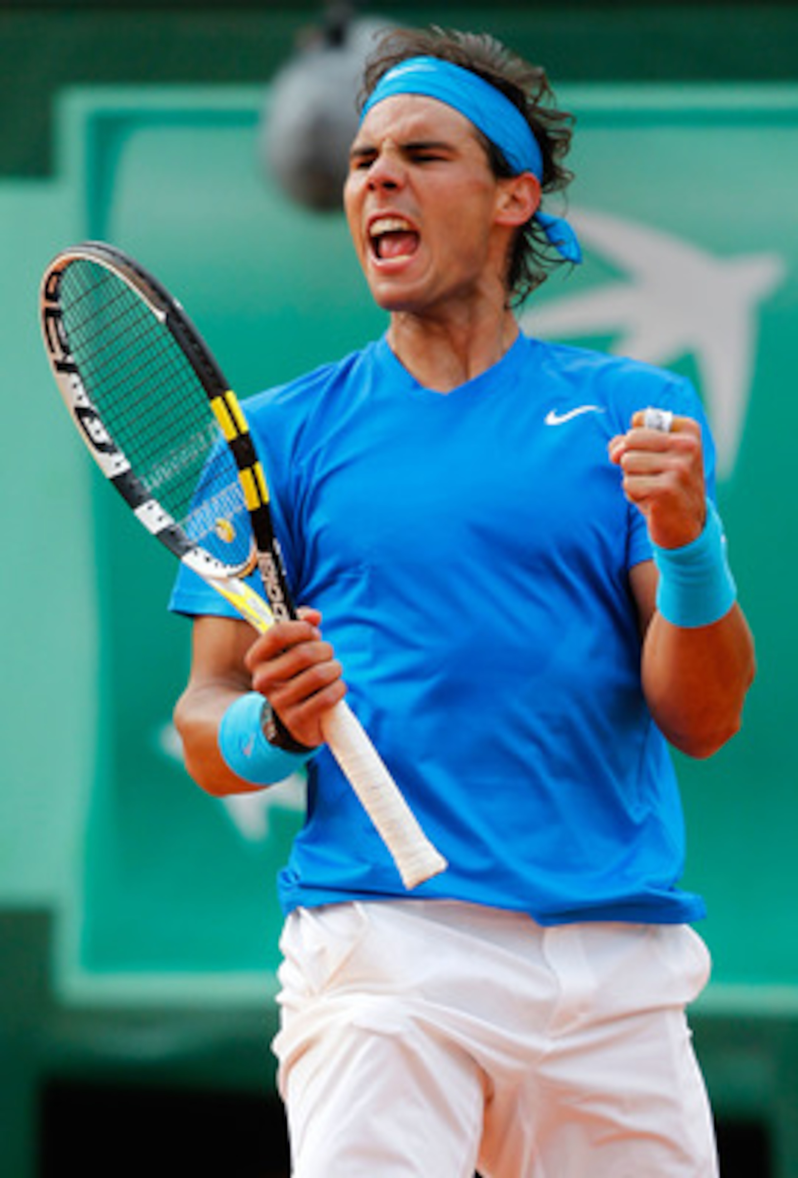 PARIS, FRANCE - MAY 26:  Rafael Nadal of Spain celebrates following his victory during the men's singles round two match between Rafael Nadal of Spain and Pablo Andujar of Spain on day five of the French Open at Roland Garros on May 26, 2011 in Paris, Fra