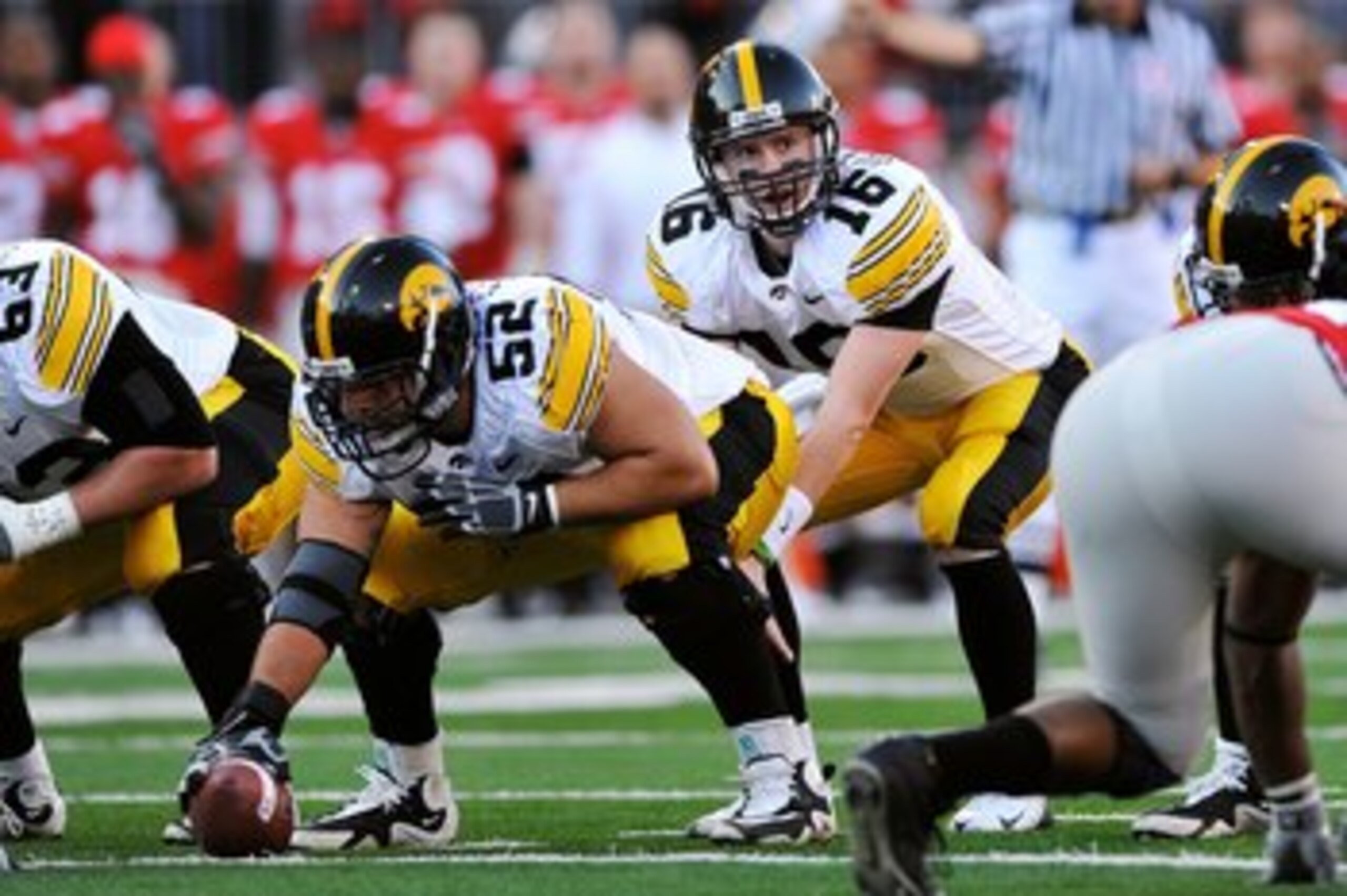 COLUMBUS, OH - NOVEMBER 14:  Quarterback James Vandenberg #16 of the Iowa Hawkeyes takes the snap from center against the Ohio State Buckeyes at Ohio Stadium on November 14, 2009 in Columbus, Ohio.  (Photo by Jamie Sabau/Getty Images)