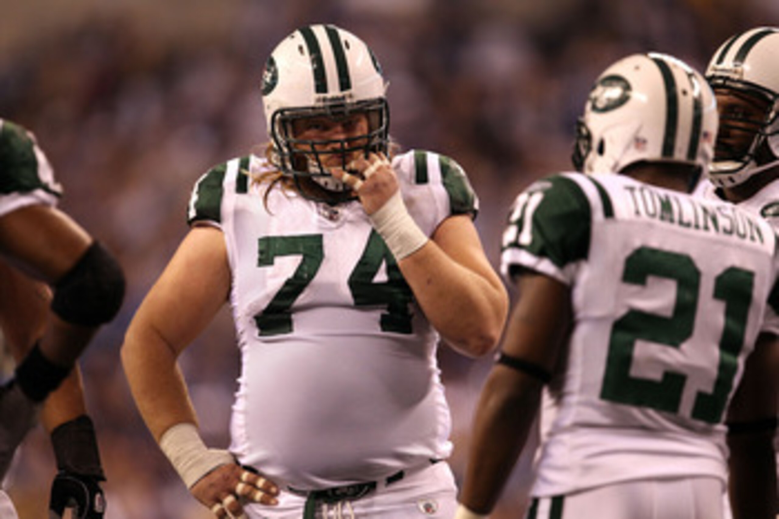 INDIANAPOLIS, IN - JANUARY 08: Nick Mangold #74 of the New York Jets looks on against the Indianapolis Colts during their 2011 AFC wild card playoff game at Lucas Oil Stadium on January 8, 2011 in Indianapolis, Indiana. The Jets won 17-16. (Photo by Jona INDIANAPOLIS, IN - JANUARY 08: Nick Mangold #74 of the New York Jets looks on against the Indianapolis Colts during their 2011 AFC wild card playoff game at Lucas Oil Stadium on January 8, 2011 in Indianapolis, Indiana. The Jets won 17-16. (Photo by Jona