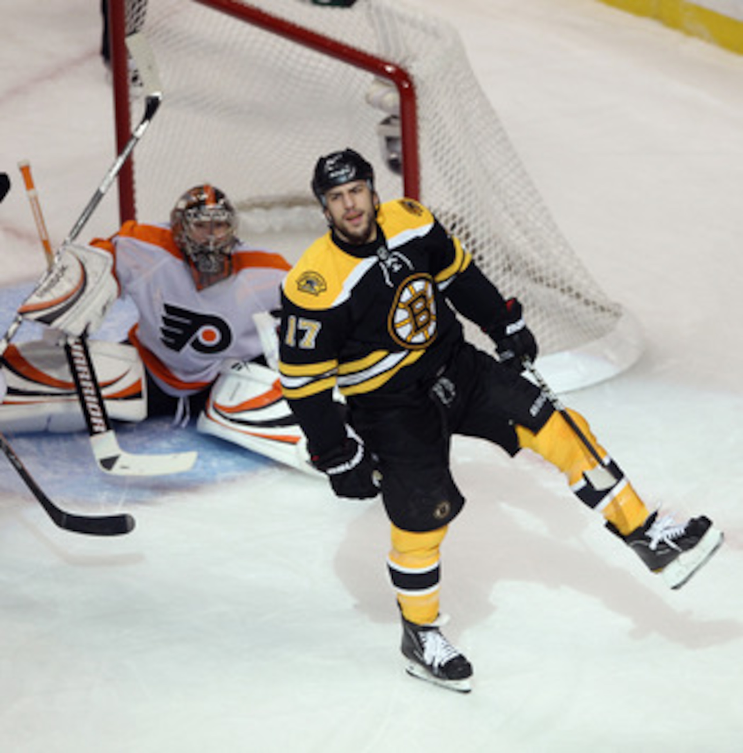 BOSTON, MA - MAY 06: Milan Lucic #17 of the Boston Bruins scores at 12:02 of the first period against Sergei Bobrovsky #35 of the Philadelphia Flyers in Game Four of the Eastern Conference Semifinals during the 2011 NHL Stanley Cup Playoffs at TD Garden BOSTON, MA - MAY 06: Milan Lucic #17 of the Boston Bruins scores at 12:02 of the first period against Sergei Bobrovsky #35 of the Philadelphia Flyers in Game Four of the Eastern Conference Semifinals during the 2011 NHL Stanley Cup Playoffs at TD Garden