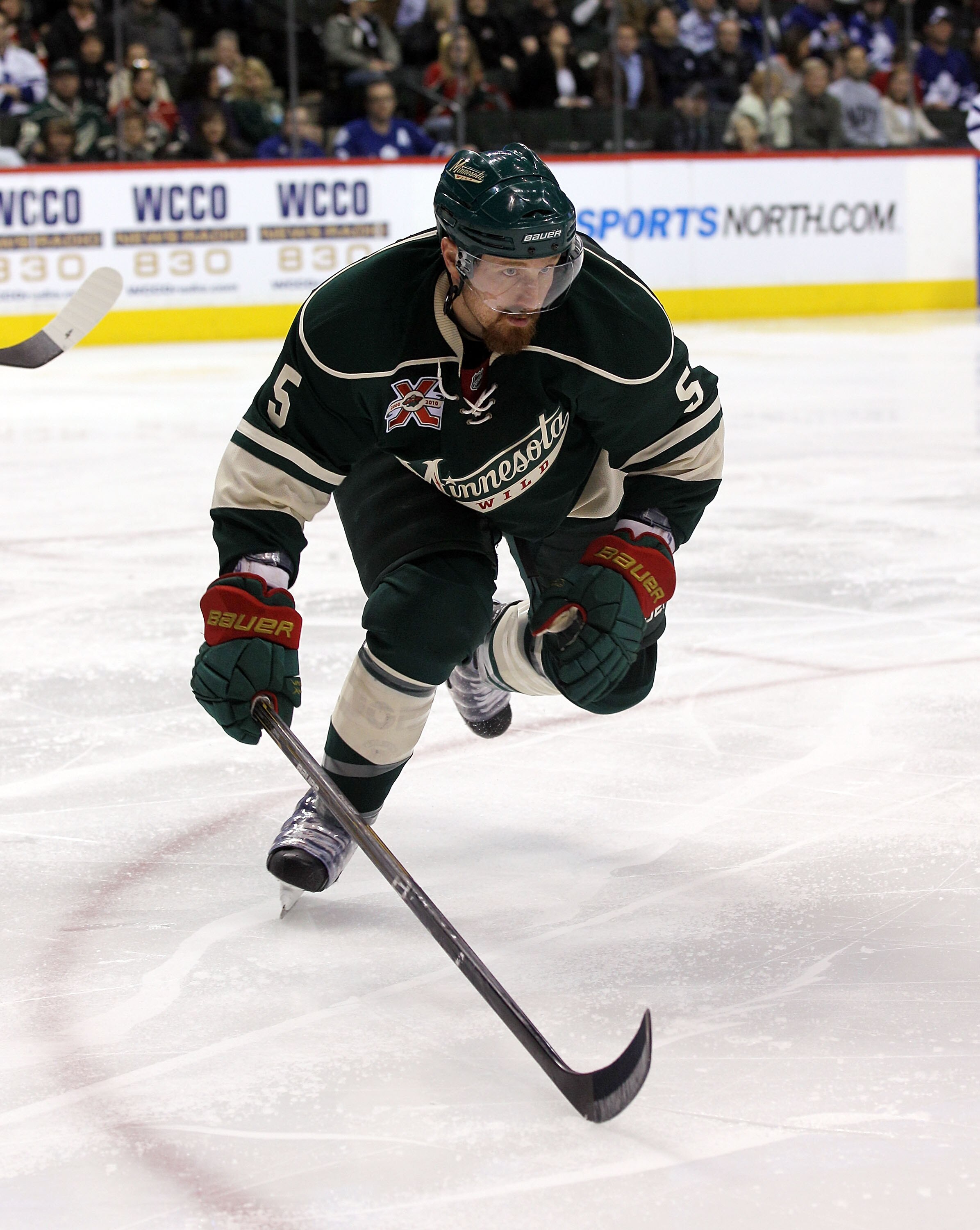 ST PAUL, MN - MARCH 22: Greg Zanon #5 of the Minnesota Wild skates against the Toronto Maple Leafs at the Xcel Energy Center on March 22, 2011 in St Paul, Minnesota.  (Photo by Bruce Bennett/Getty Images)