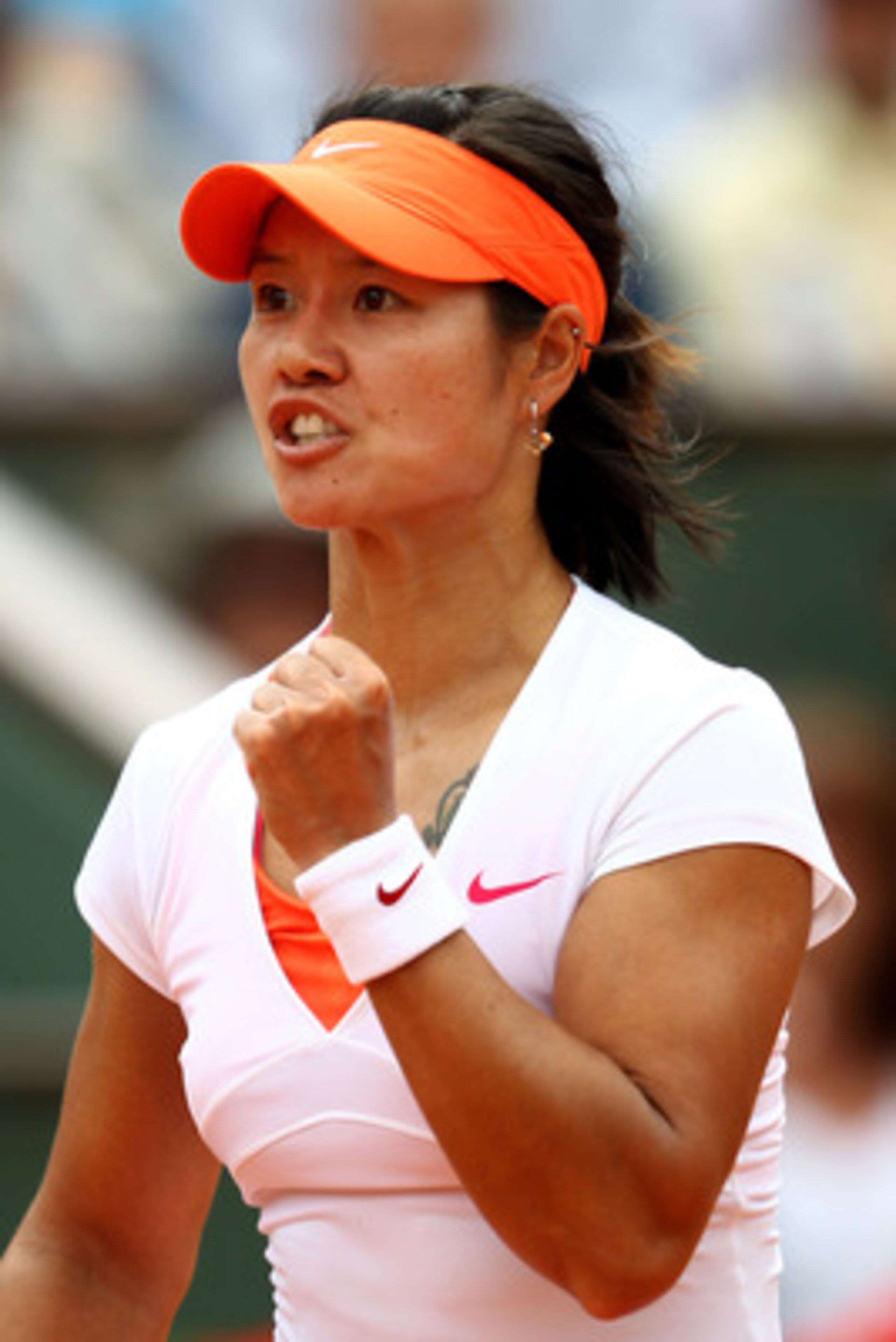 PARIS, FRANCE - MAY 30:  Na Li of China celebrates a point during the women's singles round four match between Na Li of China and Petra Kvitova of Czech Republic on day nine of the French Open at Roland Garros on May 30, 2011 in Paris, France.  (Photo by 