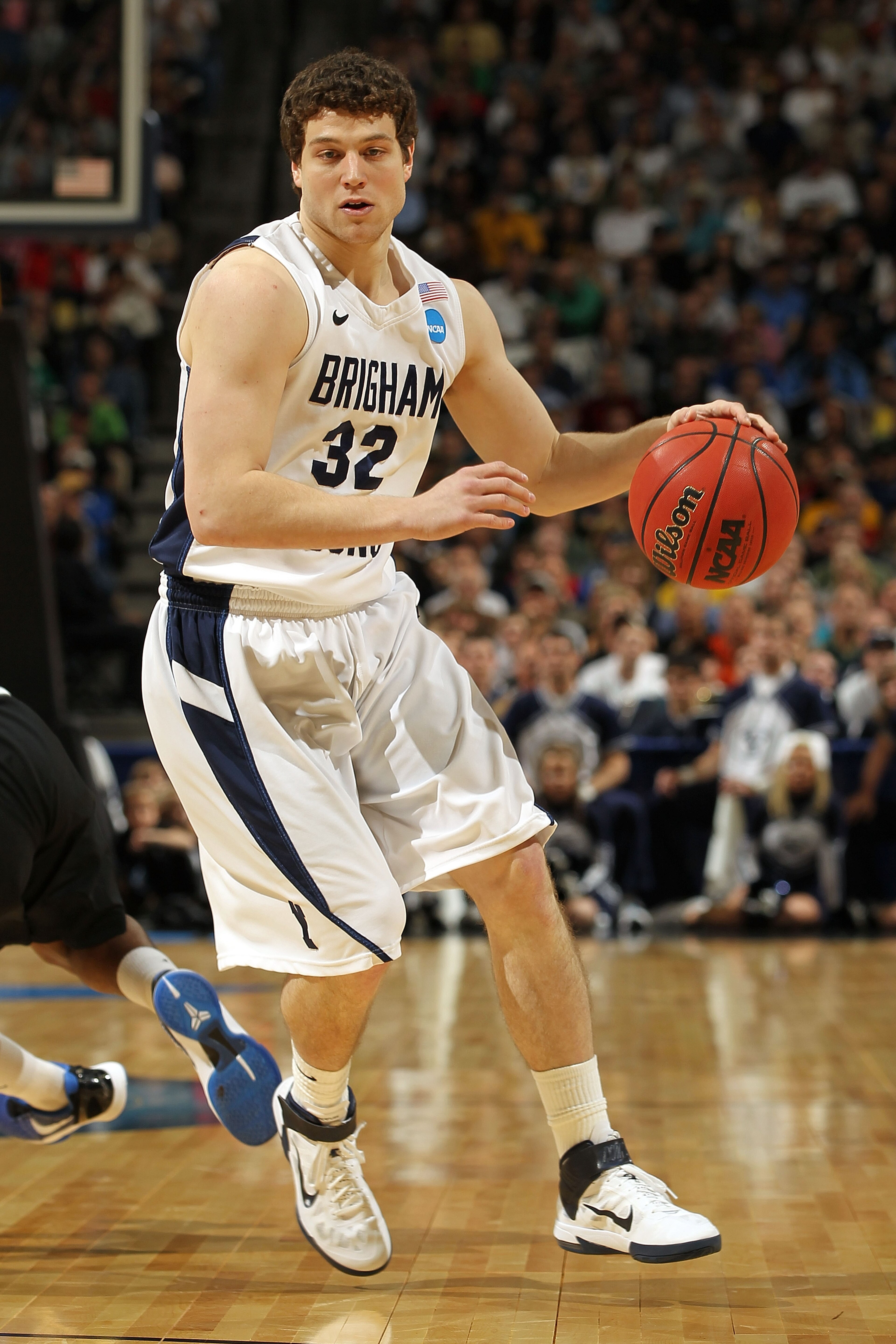 DENVER, CO - MARCH 19: Jimmer Fredette #32 of the Brigham Young Cougars handles the ball against the Gonzaga Bulldogs during the third round of the 2011 NCAA men's basketball tournament at Pepsi Center on March 19, 2011 in Denver, Colorado. (Photo by Do DENVER, CO - MARCH 19: Jimmer Fredette #32 of the Brigham Young Cougars handles the ball against the Gonzaga Bulldogs during the third round of the 2011 NCAA men's basketball tournament at Pepsi Center on March 19, 2011 in Denver, Colorado. (Photo by Do