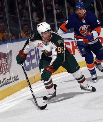 UNIONDALE, NY - MARCH 02:  Pierre-Marc Bouchard #96 of the Minnesota Wild skates against the New York Islanders at the Nassau Coliseum on March 2, 2011 in Uniondale, New York. The Islanders defeated the Wild 4-1.  (Photo by Bruce Bennett/Getty Images)