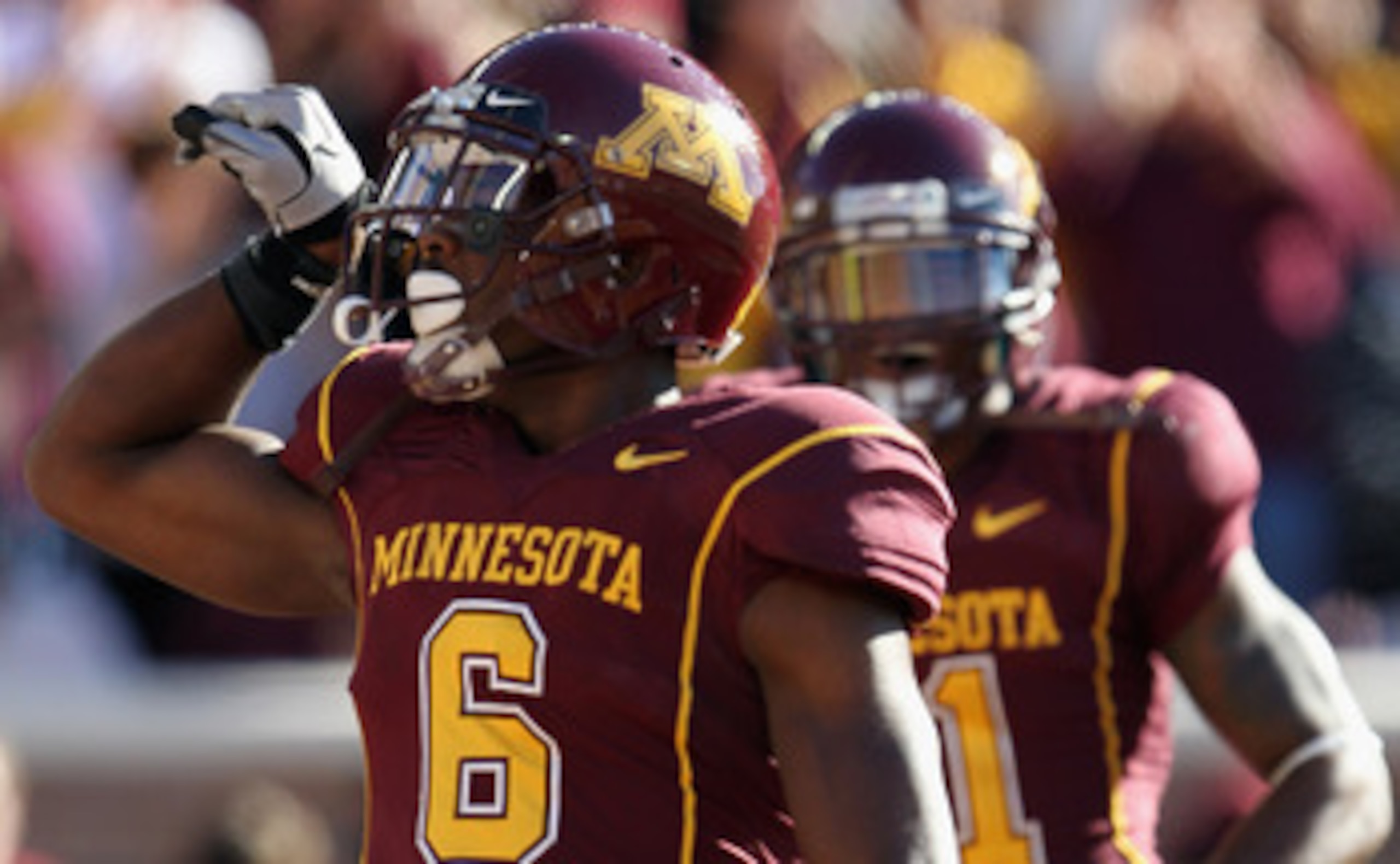 MINNEAPOLIS - SEPTEMBER 18: Da'Jon McKnight #6 of the Minnesota Golden Gophers celebrates after catching a pass for a touchdown during the game against the USC Trojans on September 18, 2010 at TCF Bank Stadium in Minneapolis, Minnesota. (Photo by Jamie MINNEAPOLIS - SEPTEMBER 18: Da'Jon McKnight #6 of the Minnesota Golden Gophers celebrates after catching a pass for a touchdown during the game against the USC Trojans on September 18, 2010 at TCF Bank Stadium in Minneapolis, Minnesota. (Photo by Jamie