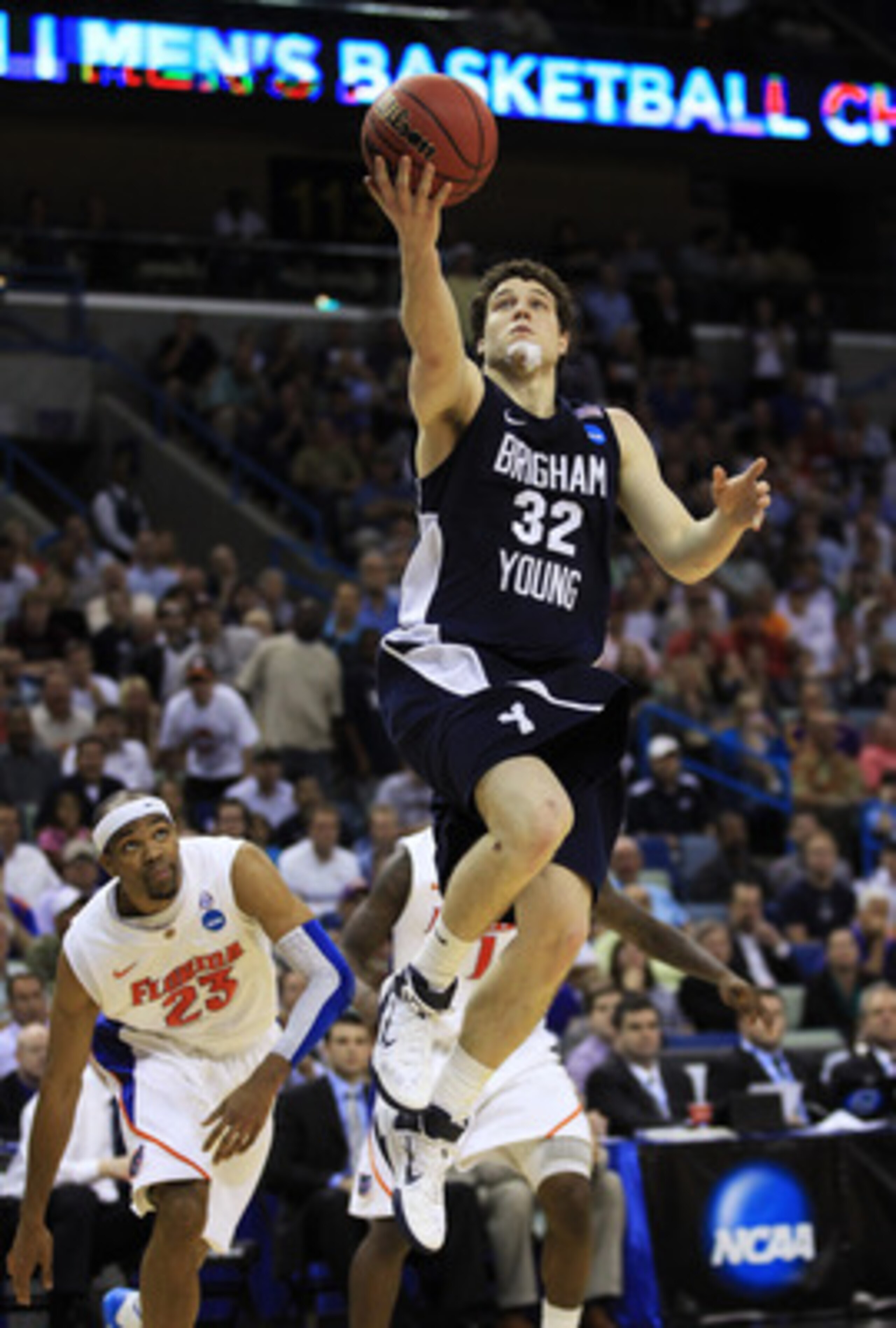 NEW ORLEANS, LA - MARCH 24:  Jimmer Fredette #32 of the Brigham Young Cougars shoots against the Florida Gators during the Southeast regional of the 2011 NCAA men's basketball tournament at New Orleans Arena on March 24, 2011 in New Orleans, Louisiana.  (