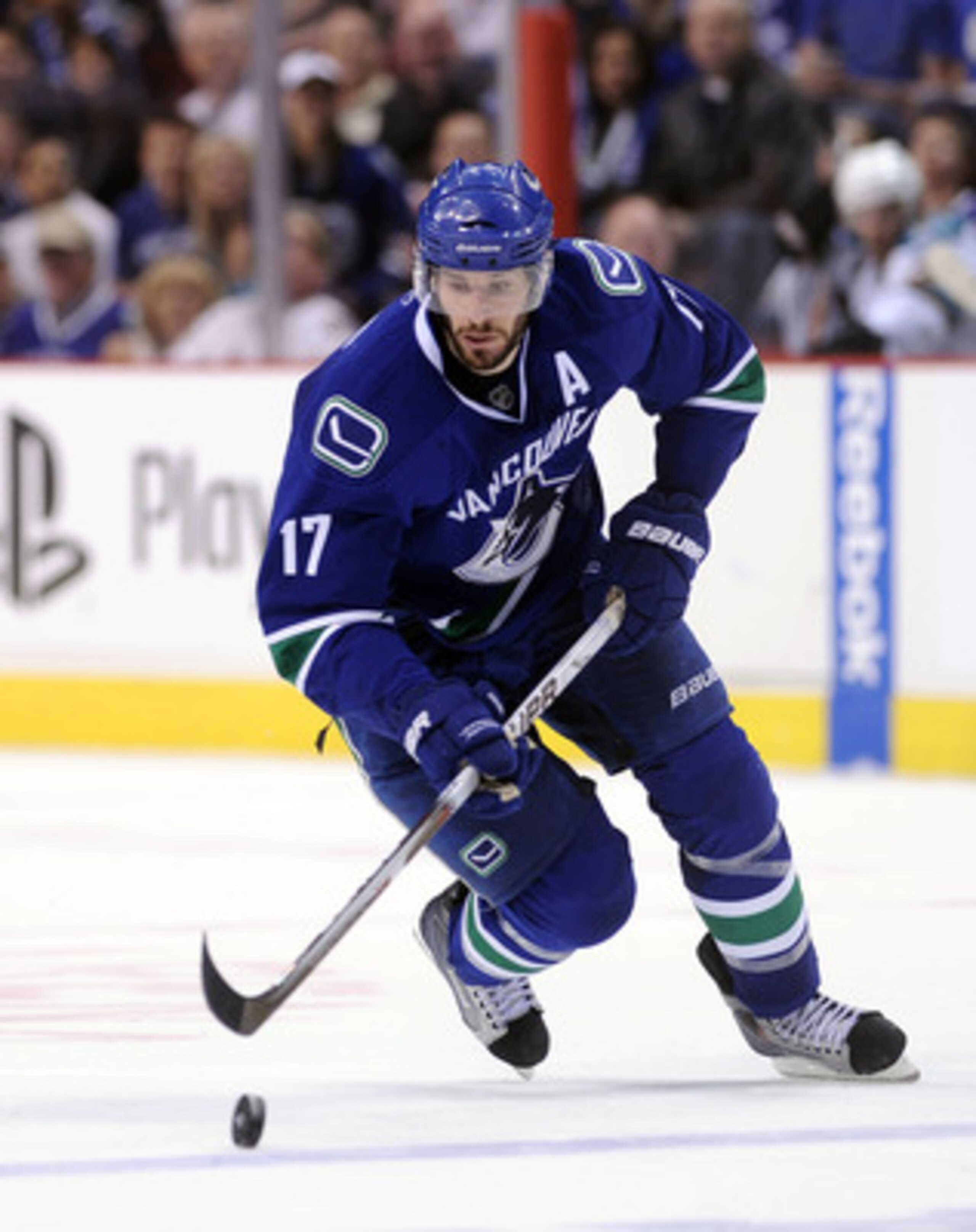 VANCOUVER, CANADA - MAY 18:  Ryan Kesler #17 of the Vancouver Canucks skates the puck across the blue line in Game Two of the Western Conference Finals against the San Jose Sharks during the 2011 Stanley Cup Playoffs at Rogers Arena on May 18, 2011 in Van