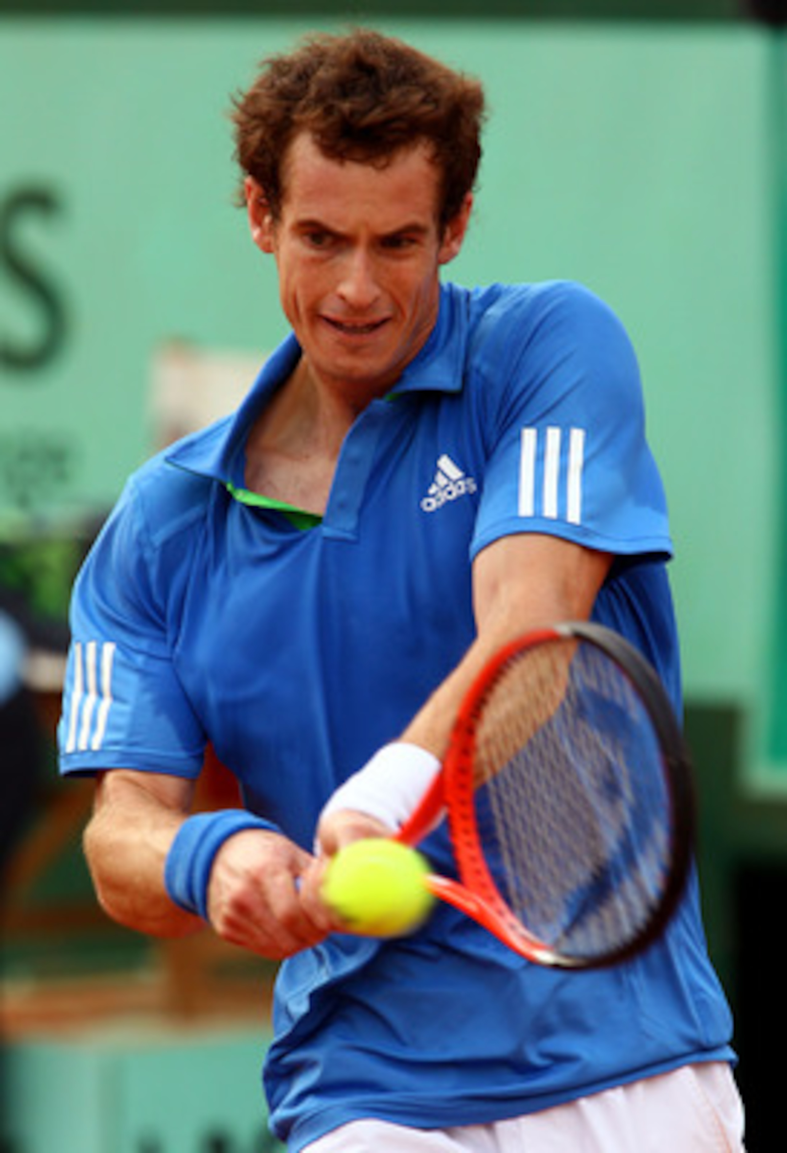 PARIS, FRANCE - MAY 30:  Andy Murray of Great Britain hits a backhand during the men's singles round four match between Andy Murray of Great Britain and Victor Troicki of Serbia on day nine of the French Open at Roland Garros on May 30, 2011 in Paris, Fra