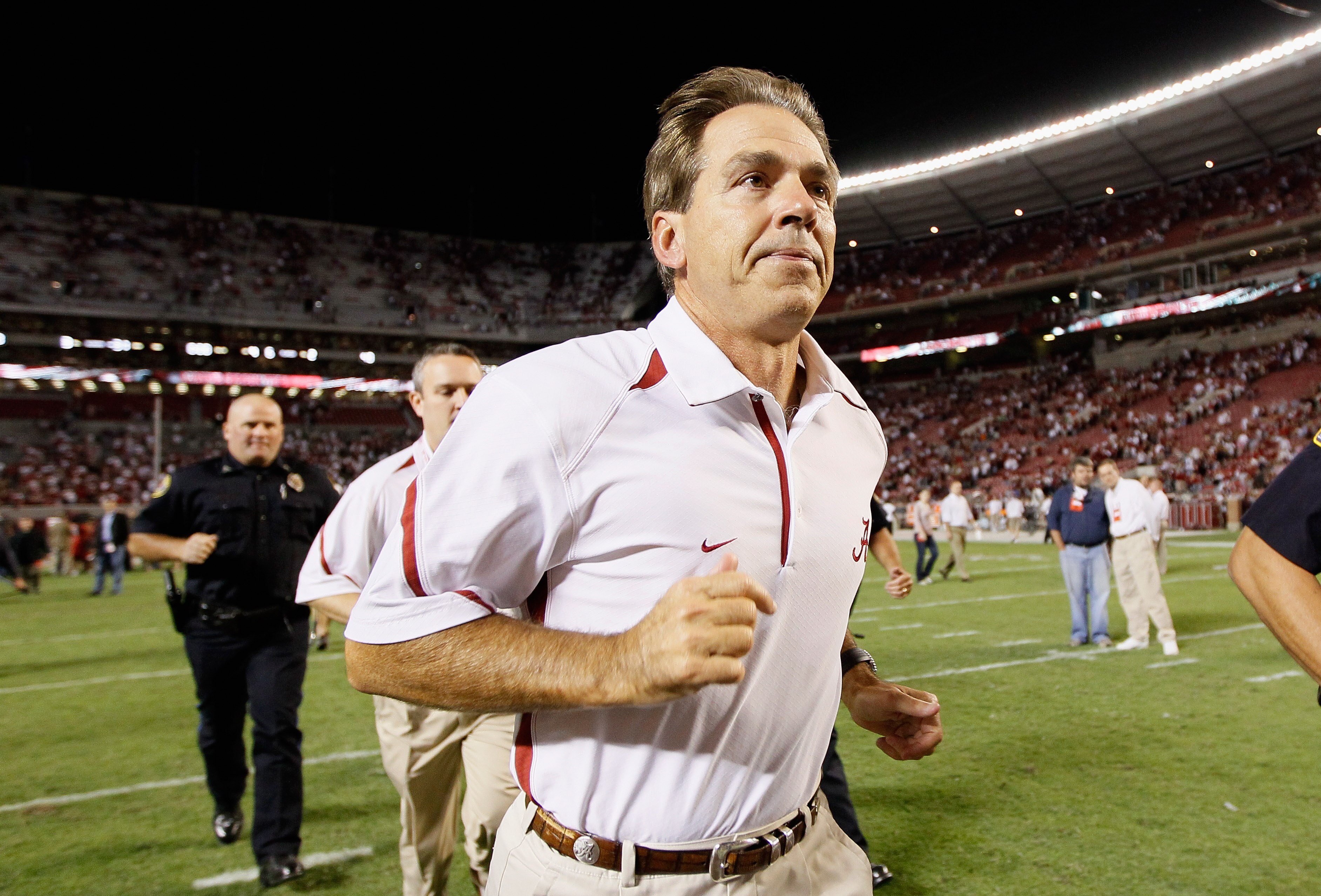 TUSCALOOSA, AL - OCTOBER 02:  Head coach Nick Saban of the Alabama Crimson Tide runs off the field after their 31-6 win over the Florida Gators at Bryant-Denny Stadium on October 2, 2010 in Tuscaloosa, Alabama.  (Photo by Kevin C. Cox/Getty Images)