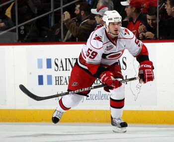 NEWARK, NJ - FEBRUARY 16:  Chad LaRose #59 of the Carolina Hurricanes skates against the New Jersey Devils at the Prudential Center on February 16, 2011 in Newark, New Jersey.  (Photo by Bruce Bennett/Getty Images)
