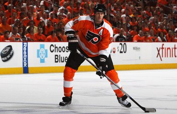 PHILADELPHIA, PA - APRIL 26:  Chris Pronger #20 of the Philadelphia Flyers controls the puck against the Buffalo Sabres in Game Seven of the Eastern Conference Quarterfinals during the 2011 NHL Stanley Cup Playoffs at Wells Fargo Center on April 26, 2011