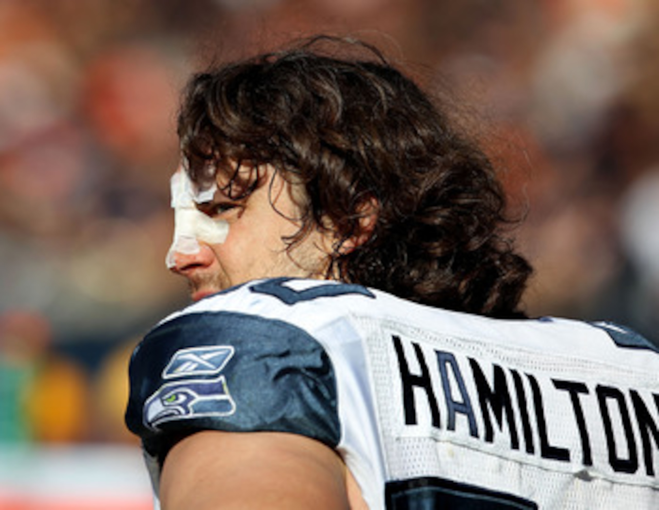 CHICAGO - OCTOBER 17: Ben Hamilton #50 of the Seattle Seahawks walks on the sidelines after breaking his nose against the Chicago Bears at Soldier Field on October 17, 2010 in Chicago, Illinois. The Seahawks defeated the Bears 23-20. (Photo by Jonathan Da CHICAGO - OCTOBER 17: Ben Hamilton #50 of the Seattle Seahawks walks on the sidelines after breaking his nose against the Chicago Bears at Soldier Field on October 17, 2010 in Chicago, Illinois. The Seahawks defeated the Bears 23-20. (Photo by Jonathan Da