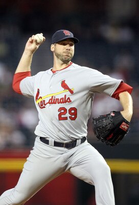 PHOENIX, AZ - APRIL 12:  Starting pitcher Chris Carpenter #29 of the St. Louis Cardinals pitches against the Arizona Diamondbacks during the Major League Baseball game at Chase Field on April 12, 2011 in Phoenix, Arizona. The Diamondbacks defeated the Car