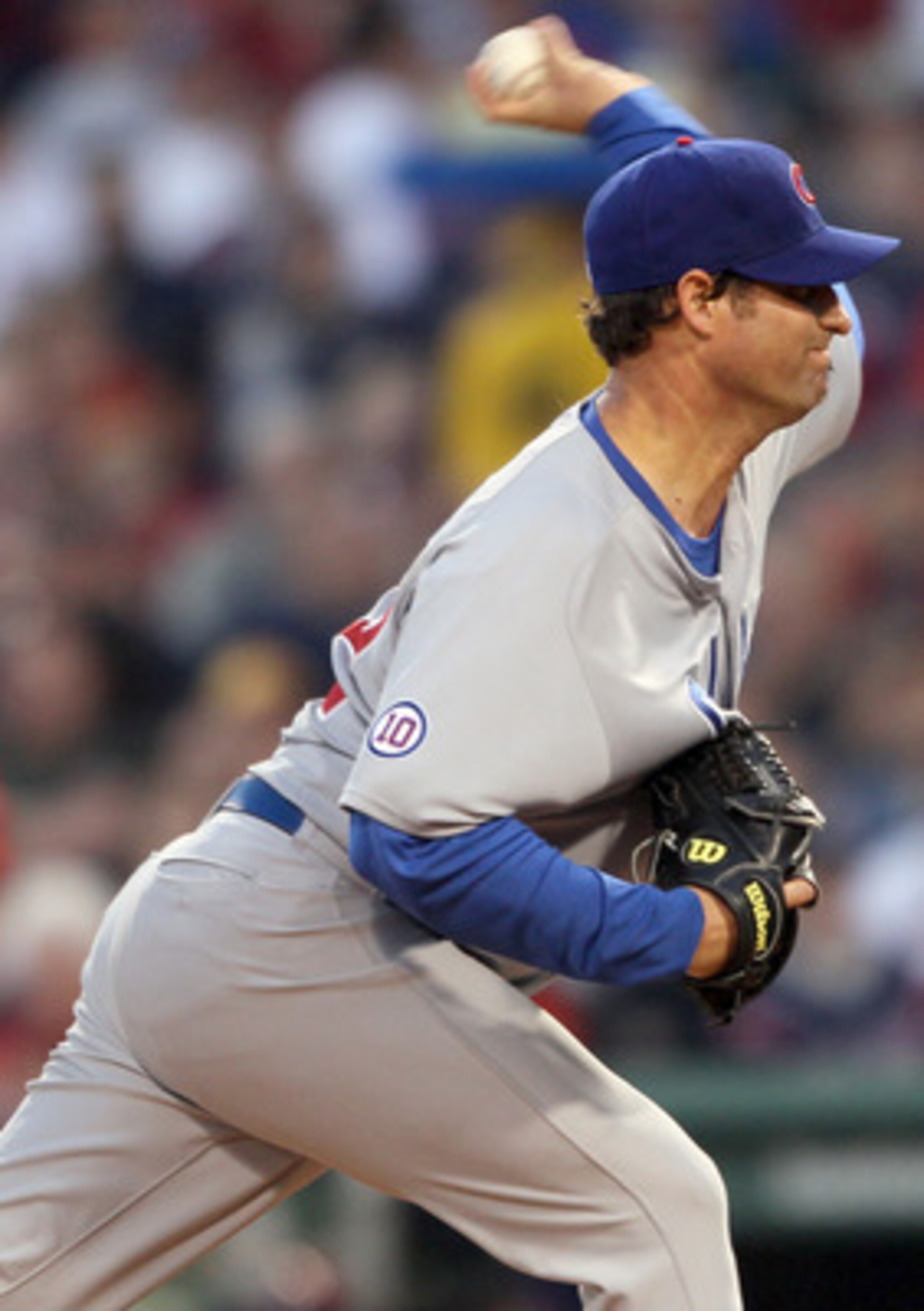 BOSTON, MA - MAY 20:  Doug Davis #32 of the Chicago Cubs delivers a pitch against the Boston Red Sox on May 20, 2011 at Fenway Park in Boston, Massachusetts.on May 20, 2011 at Fenway Park in Boston, Massachusetts. The Chicago Cubs and the Boston Red Sox h
