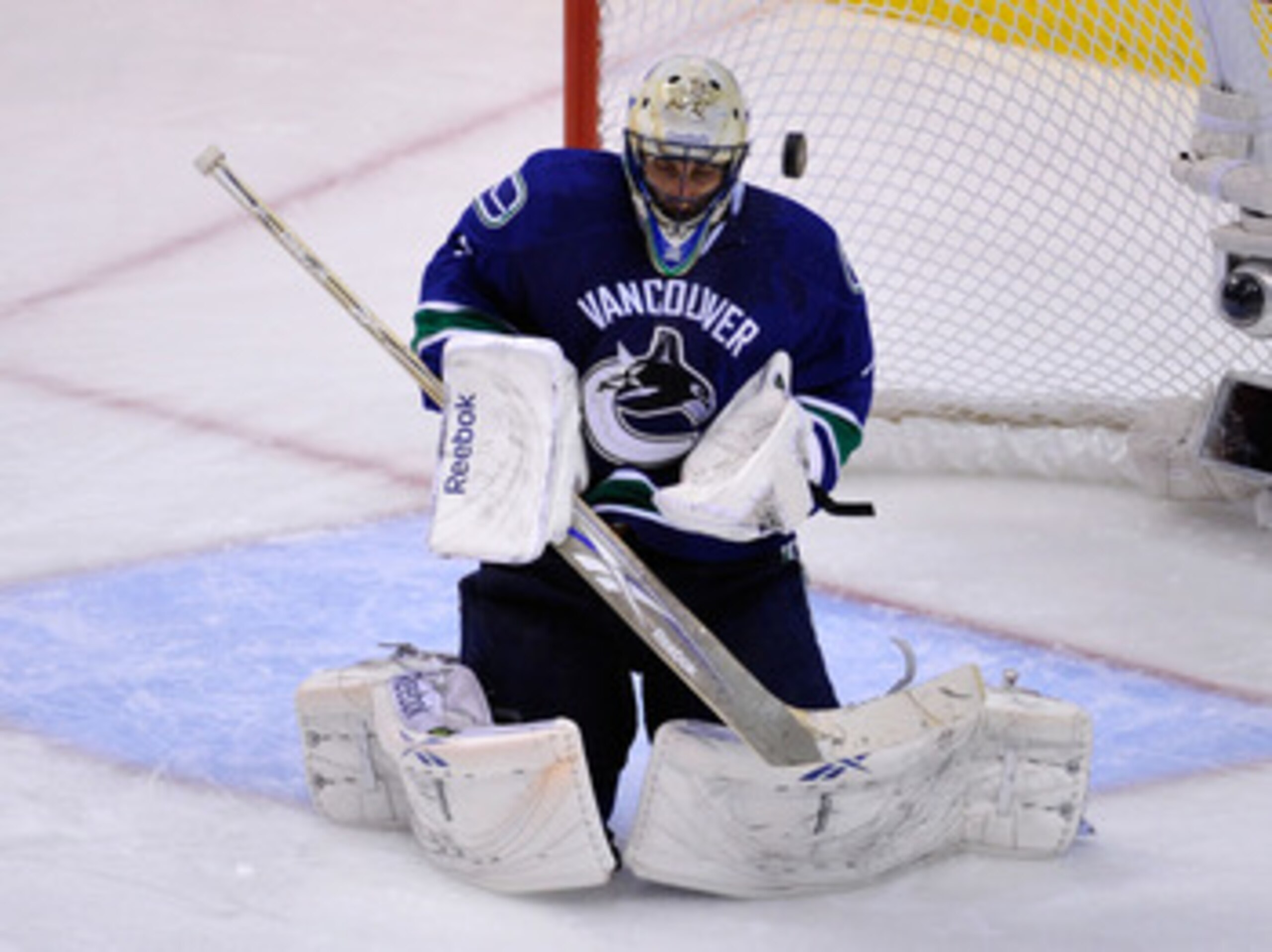 VANCOUVER, CANADA - MAY 24:  Goaltender Roberto Luongo #1 of the Vancouver Canucks makes a save in Game Five of the Western Conference Finals against the San Jose Sharks during the 2011 Stanley Cup Playoffs at Rogers Arena on May 24, 2011 in Vancouver, Br