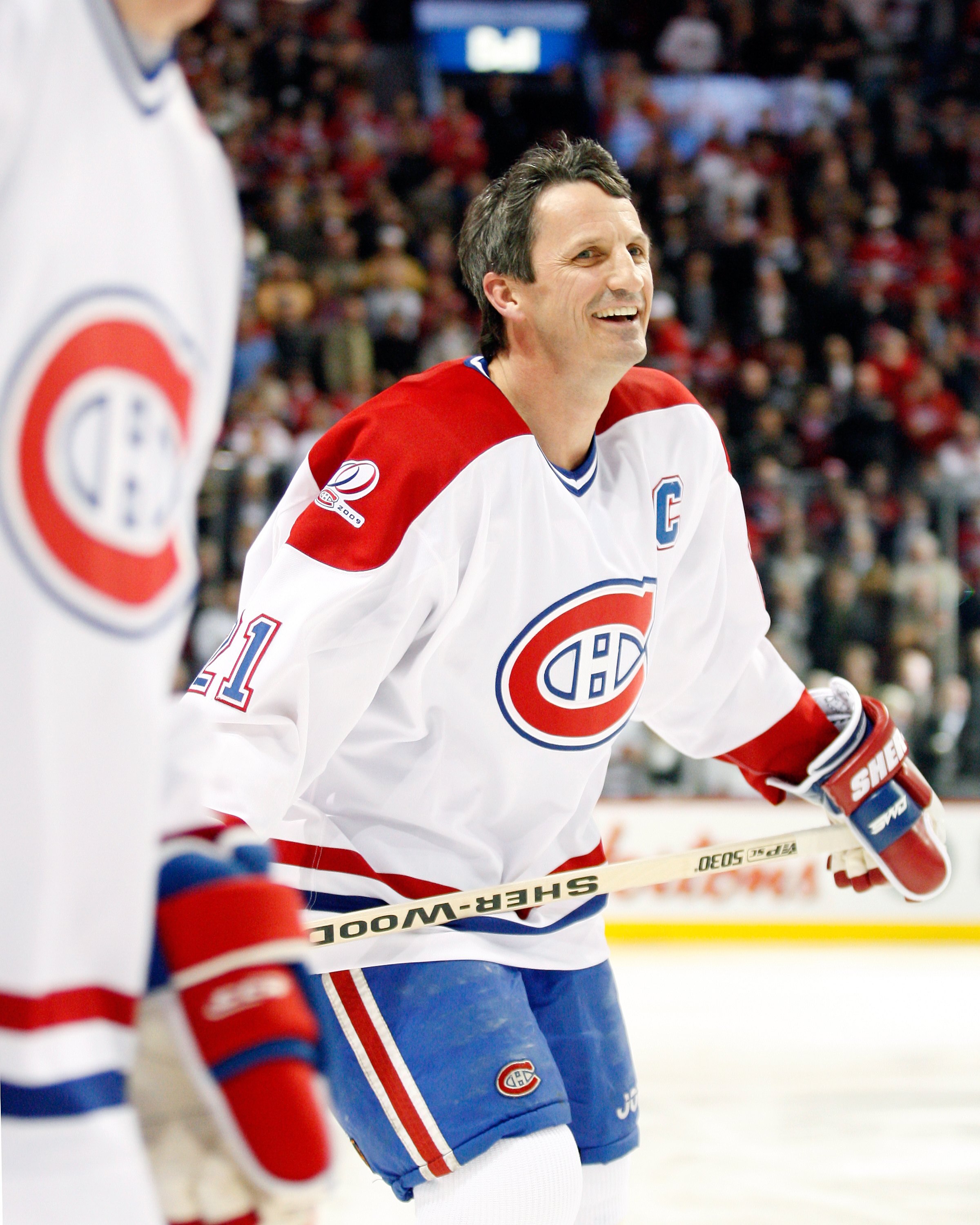 MONTREAL- DECEMBER 4:  Former Montreal Canadien Guy Carbonneau skates during the Centennial Celebration ceremonies prior to the NHL game between the Montreal Canadiens and Boston Bruins on December 4, 2009 at the Bell Centre in Montreal, Quebec, Canada.