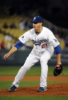 LOS ANGELES, CA - APRIL 20:  Jon Garland #21 of the Los Angeles Dodgers pitches in the ninth inning against the Atlanta Braves at Dodger Stadium on April 20, 2011 in Los Angeles, California.  (Photo by Lisa Blumenfeld/Getty Images)