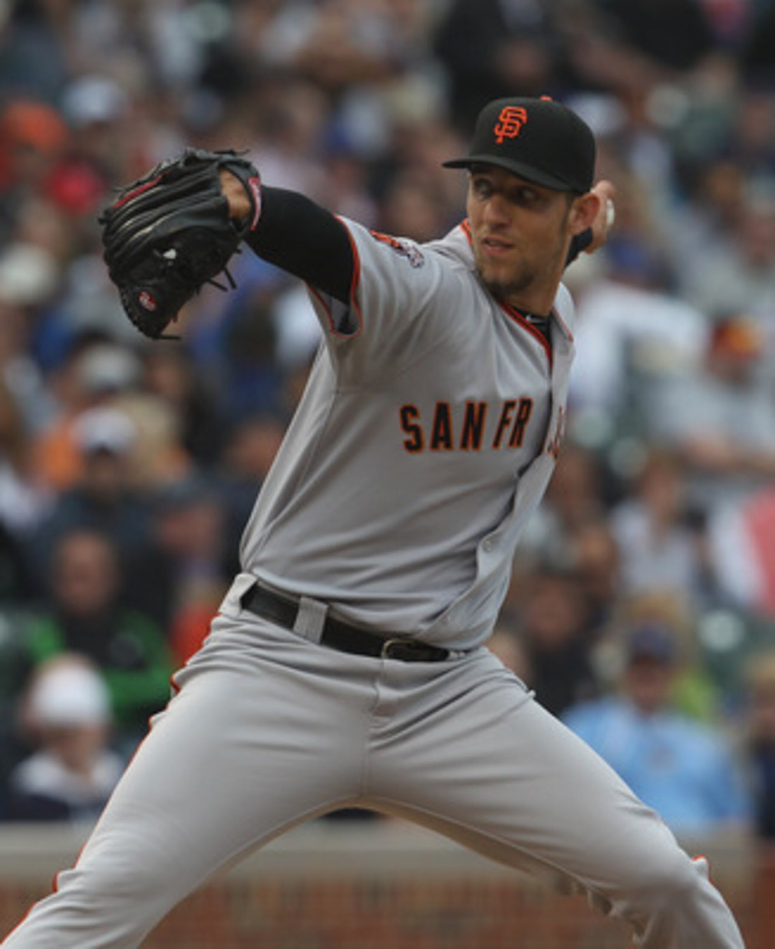 CHICAGO, IL - MAY 13:  Starting pitcher Madison Bumgarner #40 of the San Francisco Giants delivers the ball against the Chicago Cubs at Wrigley Field on May 13, 2011 in Chicago, Illinois. The Cubs defeated the Giants 11-4. (Photo by Jonathan Daniel/Getty 