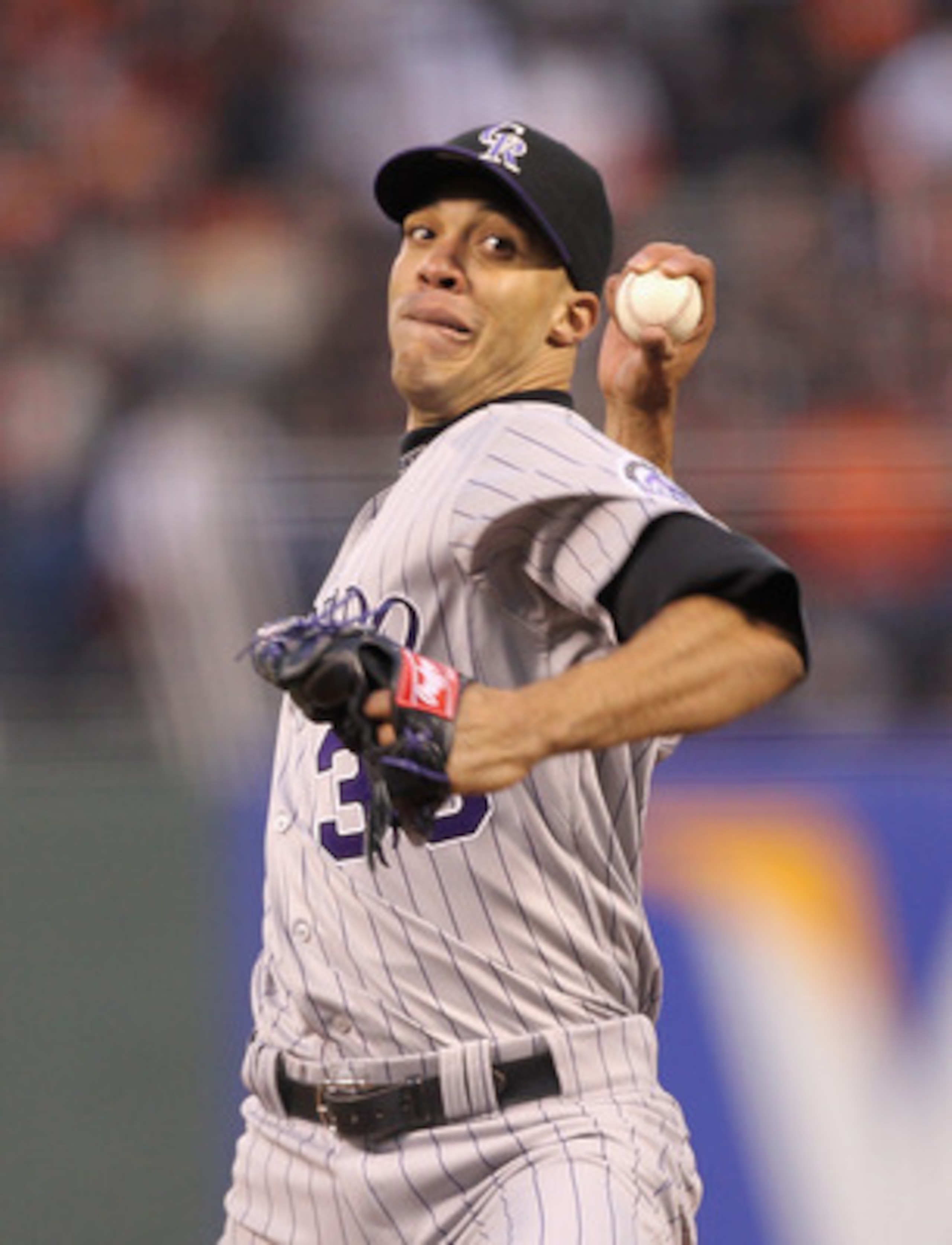 SAN FRANCISCO, CA - MAY 06:  Ubaldo Jimenez #38 of the Colorado Rockies pitches against the San Francisco Giants at AT&T Park on May 6, 2011 in San Francisco, California.  (Photo by Ezra Shaw/Getty Images)
