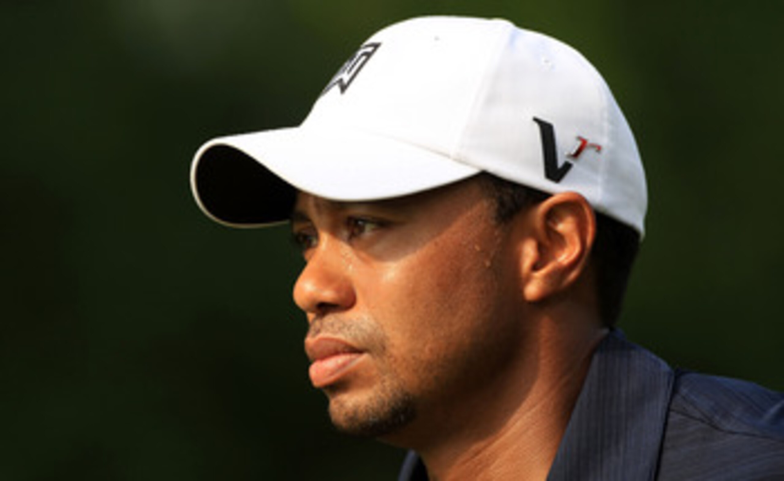 PONTE VEDRA BEACH, FL - MAY 12:  Tiger Woods looks on from the fifth hole during the first round of THE PLAYERS Championship held at THE PLAYERS Stadium course at TPC Sawgrass on May 12, 2011 in Ponte Vedra Beach, Florida.  (Photo by Streeter Lecka/Getty 