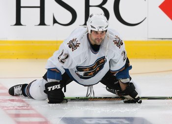 VANCOUVER, CANADA - OCTOBER 27:  Rico Fata #22 of the Washington Capitals stretches during warm up prior to the game against the Vancouver Canucks at General Motors Place on October 27, 2006 in Vancouver, British Columbia, Canada.  The Canucks defeated th