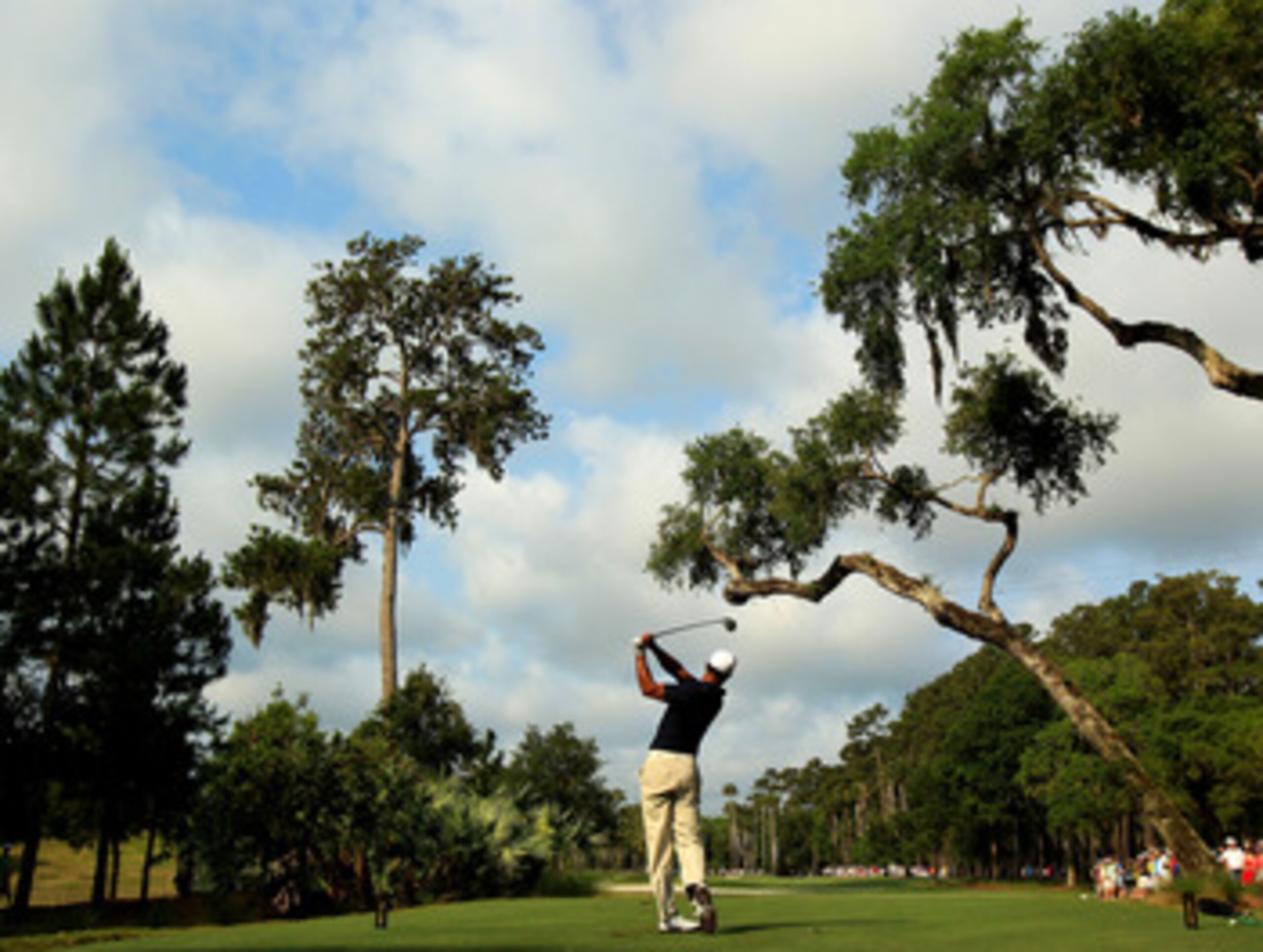 PONTE VEDRA BEACH, FL - MAY 12:  Tiger Woods hits his tee shot on the sixth hole during the first round of THE PLAYERS Championship held at THE PLAYERS Stadium course at TPC Sawgrass on May 12, 2011 in Ponte Vedra Beach, Florida. Woods withdrew after shoo
