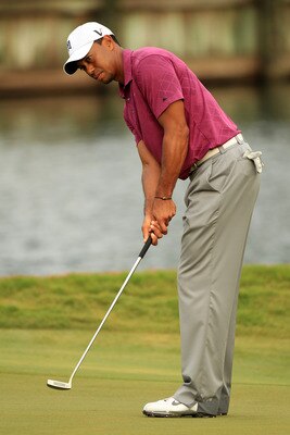 PONTE VEDRA BEACH, FL - MAY 11:  Tiger Woods putts during a practice round prior to the start of THE PLAYERS Championship held at THE PLAYERS Stadium course at TPC Sawgrass on May 11, 2011 in Ponte Vedra Beach, Florida.  (Photo by Streeter Lecka/Getty Ima