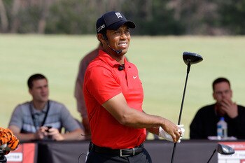 CHUNCHEON, SOUTH KOREA - APRIL 14:  U.S. golfer Tiger Woods participates in a golf teaching clinic for South Korean juniors during a Nike Golf 'Make It Happen' event at Jade Palace Golf Club on April 14, 2011 in Chuncheon, South Korea.  (Photo by Chung Su