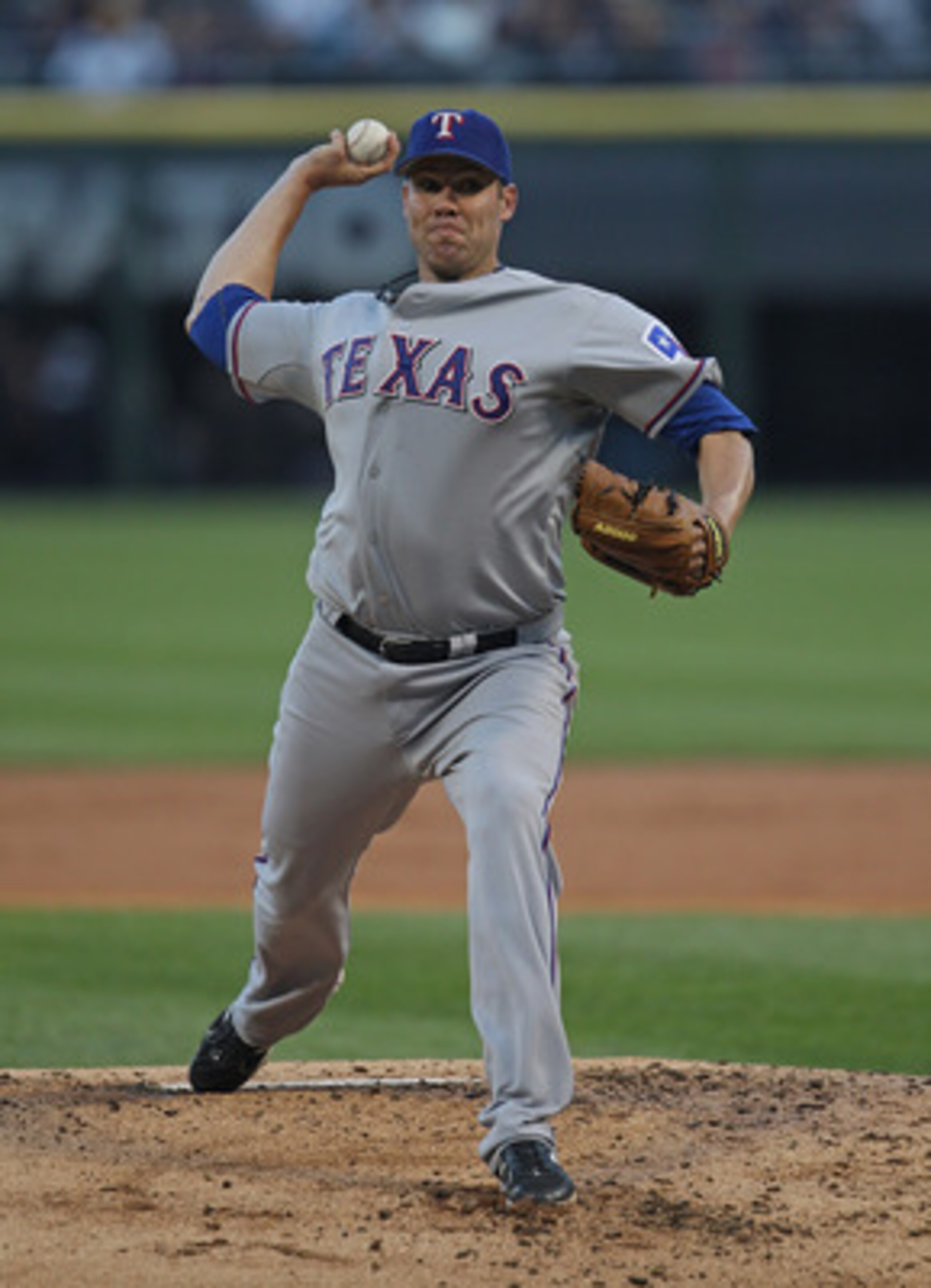 CHICAGO, IL - MAY 16: Starting pitcher Colby Lewis #48 of the Texas Rangers delivers the ball against the Chicago White Sox at U.S. Cellular Field on May 16, 2011 in Chicago, Illinois. The Rangers defeated the White Sox 4-0. (Photo by Jonathan Daniel/Gett