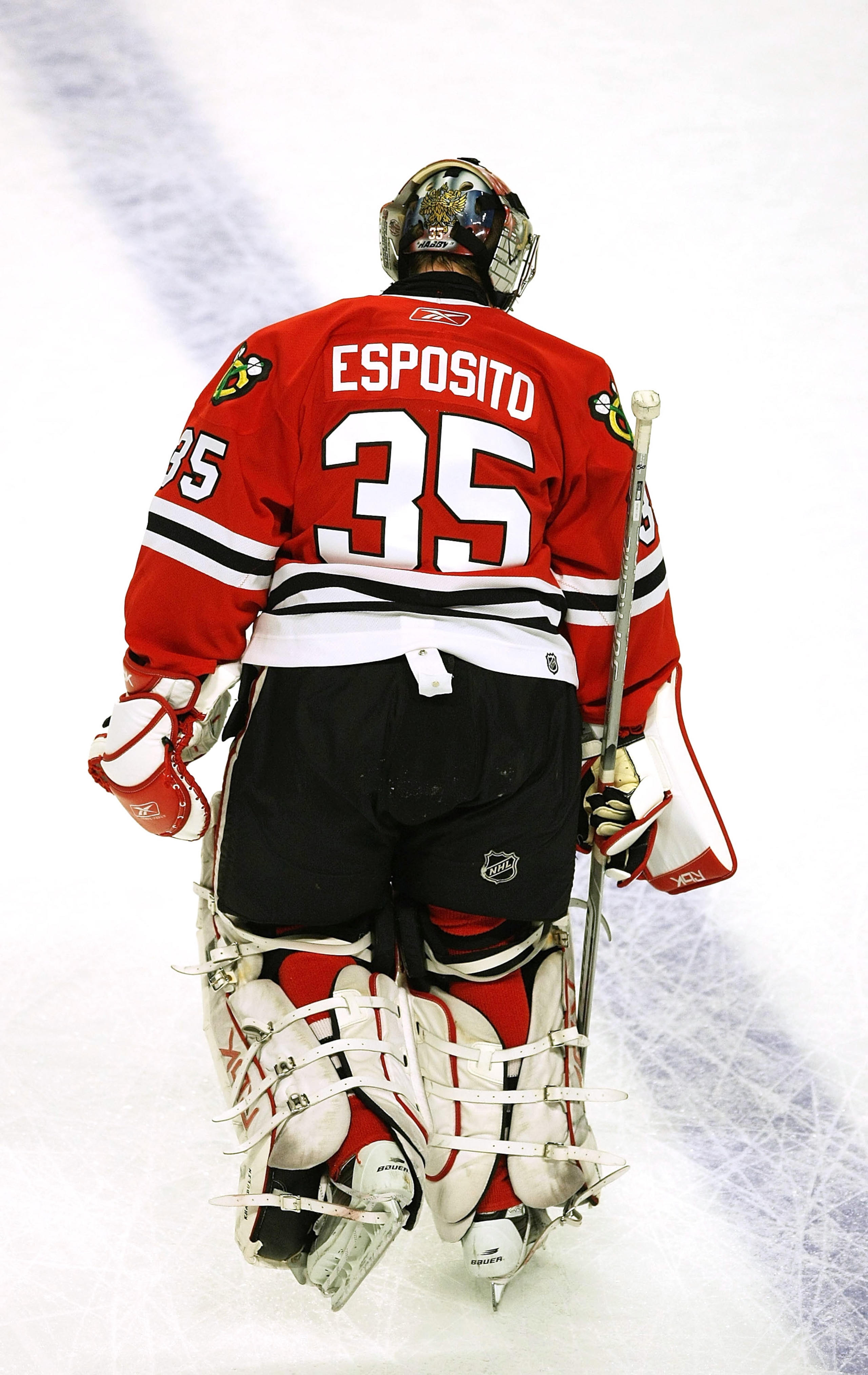 CHICAGO - MARCH 19: Goaltender Nikolai Khabibulin of the Chicago Blackhawks wears a jersey honoring former Blackhawk goaltender Tony Esposito during warm-ups before a game against the Washington Capitals on March 19, 2008 at the United Center in Chicago,