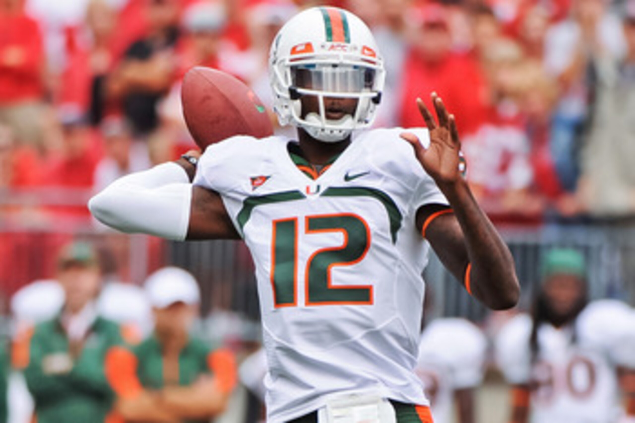 COLUMBUS, OH - SEPTEMBER 11:  Quarterback Jacory Harris #12 of the Miami Hurricanes passes the ball against the Ohio State Buckeyes at Ohio Stadium on September 11, 2010 in Columbus, Ohio.  (Photo by Jamie Sabau/Getty Images)