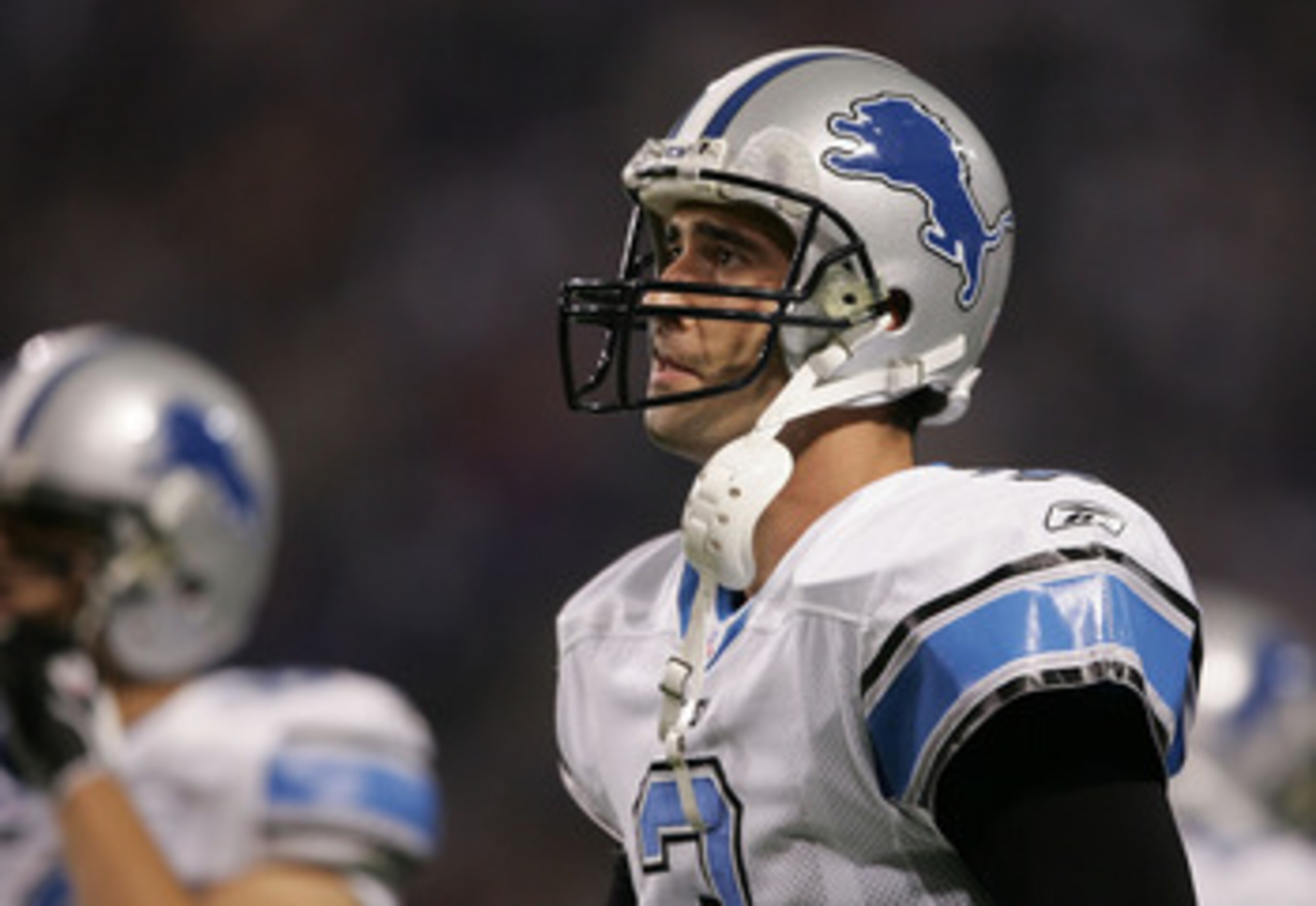 MINNEAPOLIS - NOVEMBER 6: Joey Harrington #3 of the Detroit Lions walks off the field on November 6, 2005 at the Hubert H. Humphrey Metrodome in Minneapolis, Minnesota. The Minnesota Vikings defeated the Detroit Lions 27-14. (Photo by Elsa/Getty Images).