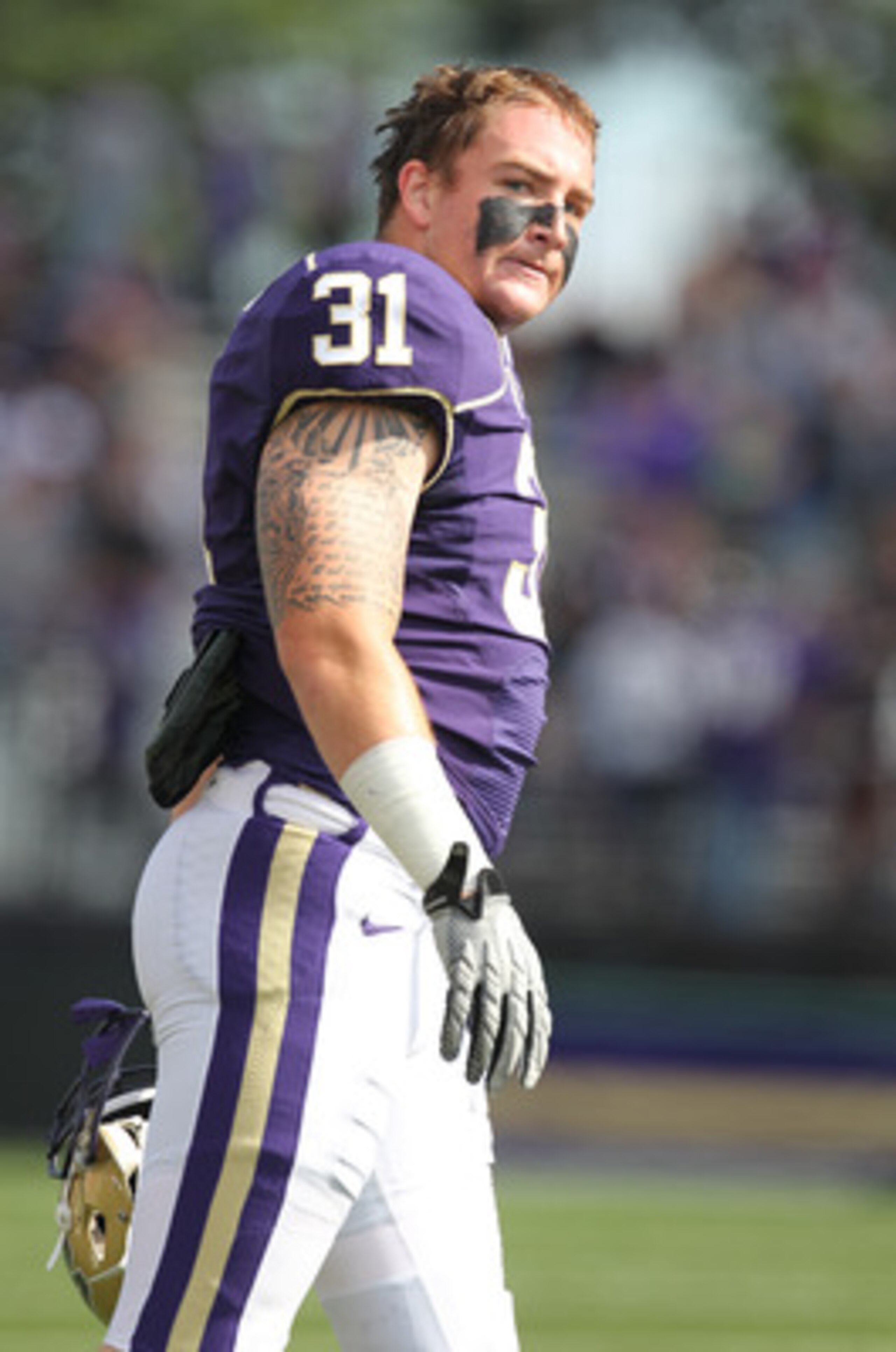 SEATTLE - SEPTEMBER 11:  Linebacker Cort Dennison #31 of the Washington Huskies looks on prior to the game against the Syracuse Orange on September 11, 2010 at Husky Stadium in Seattle, Washington. (Photo by Otto Greule Jr/Getty Images)
