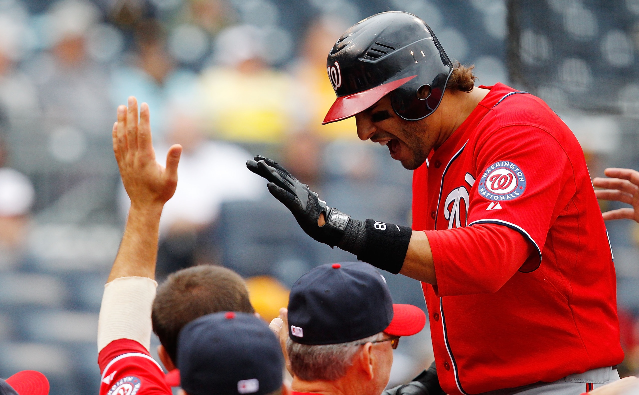 PITTSBURGH - APRIL 24:  Michael Morse #38 of the Washington Nationals celebrates with teammates after hitting a three run home run against the Pittsburgh Pirates during the game on April 24, 2011 at PNC Park in Pittsburgh, Pennsylvania.  (Photo by Jared W