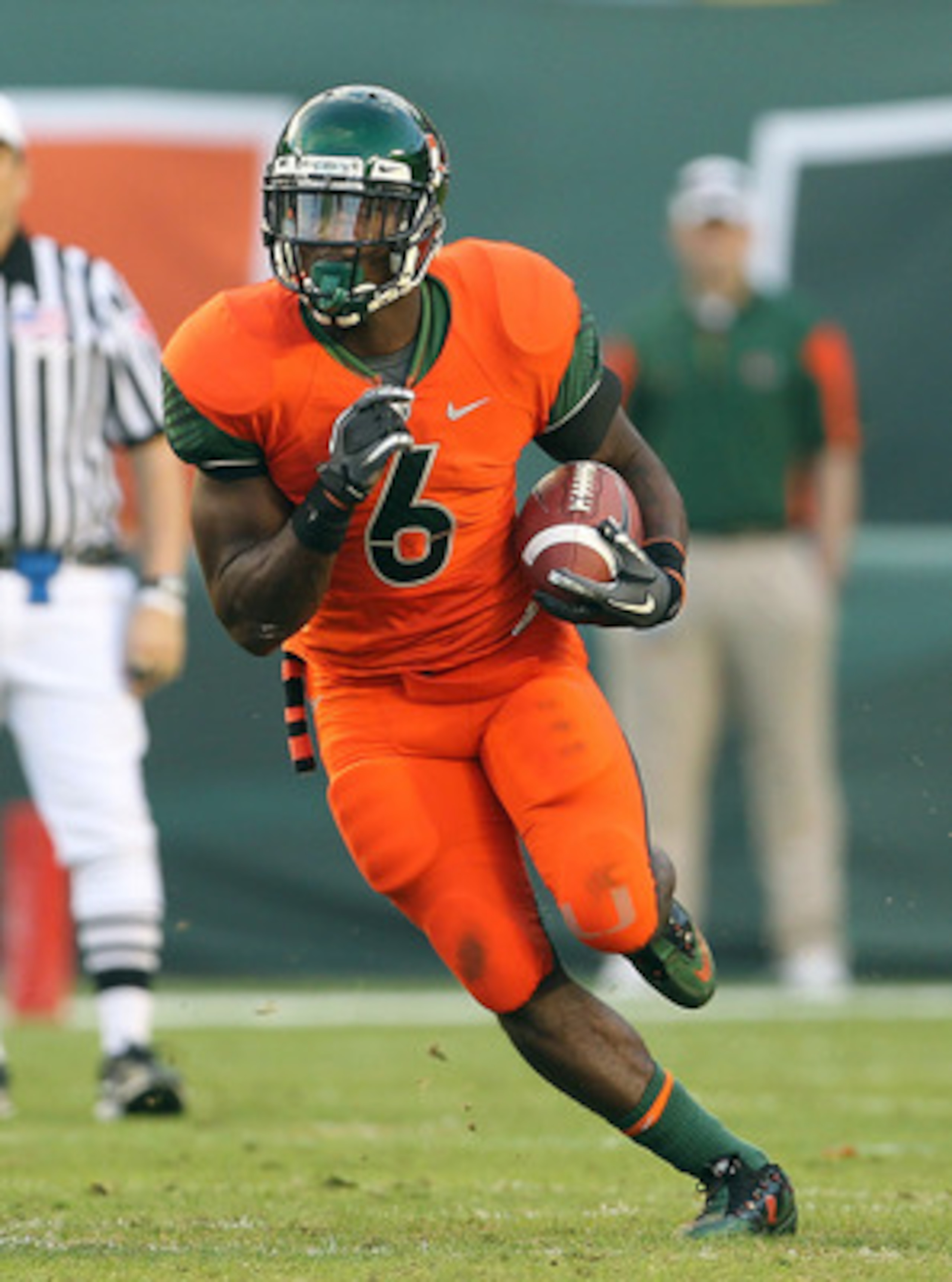 MIAMI - NOVEMBER 20:  Lamar Miller #6 of the Miami Hurricanes runs for a touchdown during a game against the Virginia Tech Hokies at Sun Life Stadium on November 20, 2010 in Miami, Florida.  (Photo by Mike Ehrmann/Getty Images)